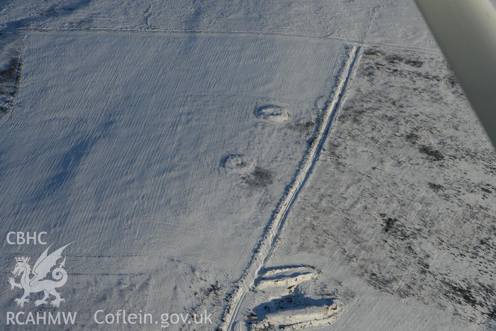 RCAHMW colour oblique photograph of Mynydd Kilkiffeth cairns. Taken by Toby Driver on 01/12/2010.