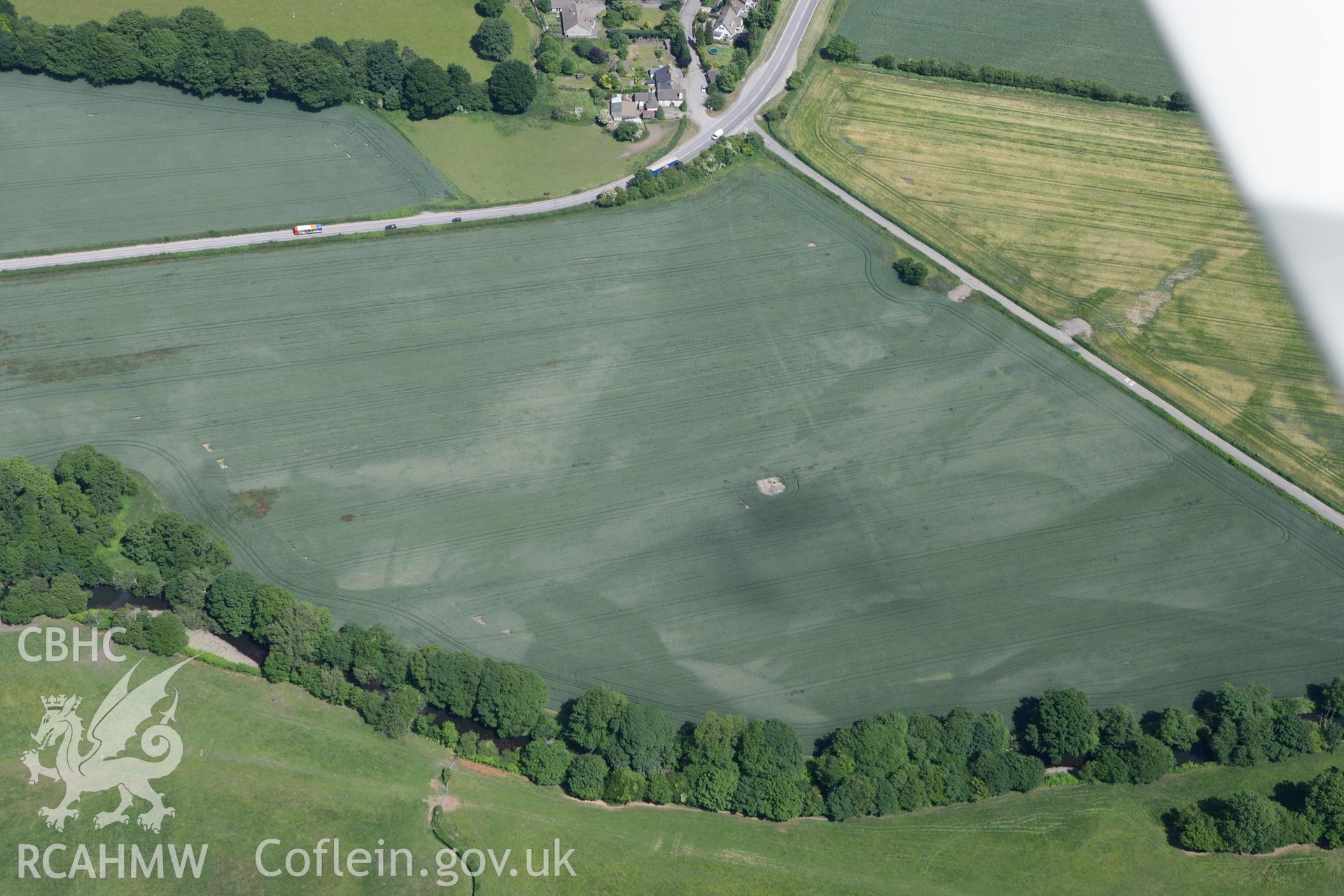 RCAHMW colour oblique photograph of False cropmarks to the West of Lower Machen Roman Site. Taken by Toby Driver on 21/06/2010.
