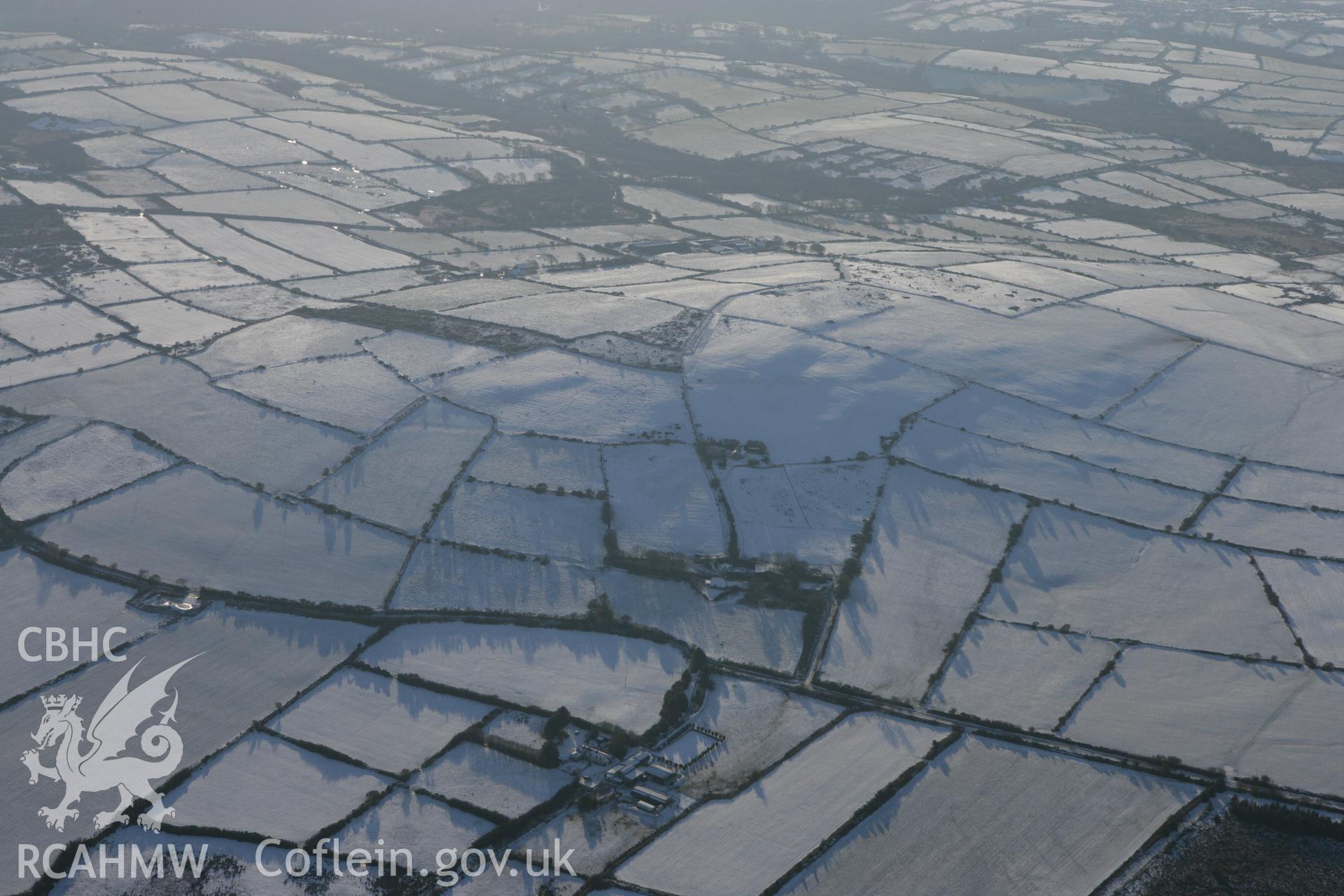 RCAHMW colour oblique photograph of Mynydd Bach, showing possible prehistoric enclosure. Taken by Toby Driver on 01/12/2010.
