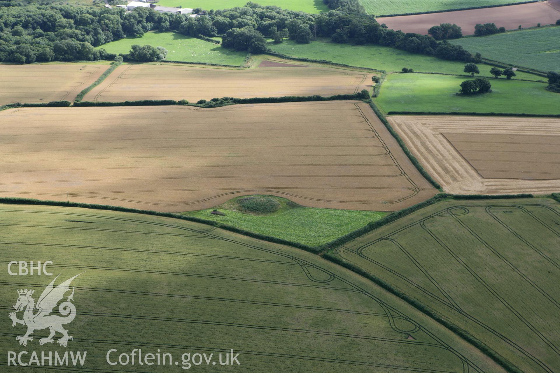 RCAHMW colour oblique photograph of Mynydd Herbert round barrow. Taken by Toby Driver on 29/07/2010.
