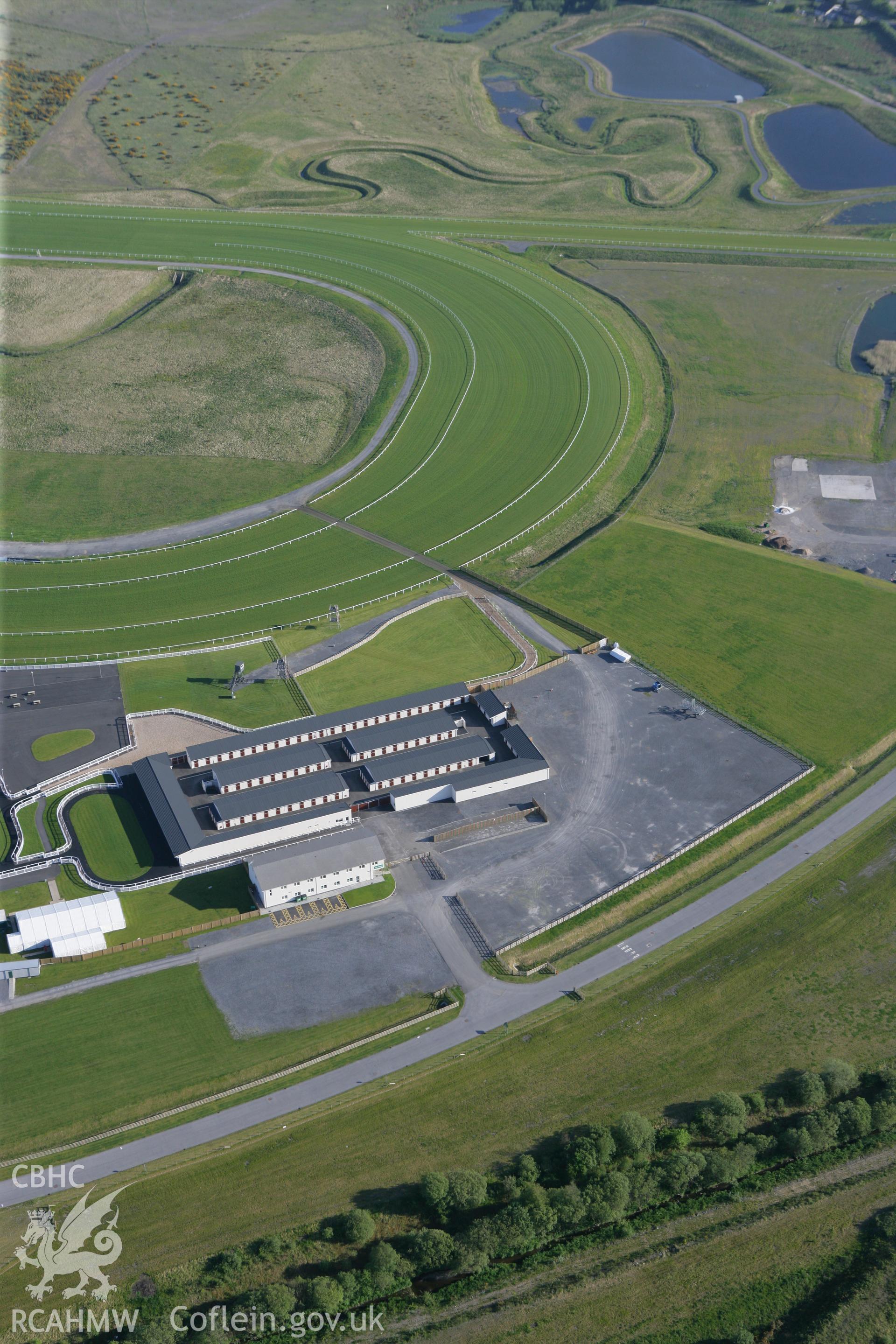 RCAHMW colour oblique photograph of Ffos Las Racecourse. Taken by Toby Driver on 24/05/2010.