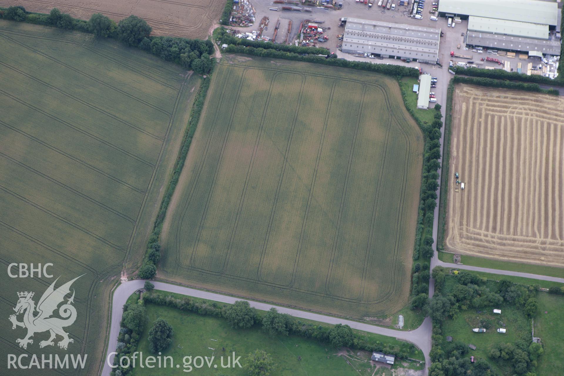 RCAHMW colour oblique photograph of Llancayo Farm Cropmark Enclosures. Taken by Toby Driver on 29/07/2010.