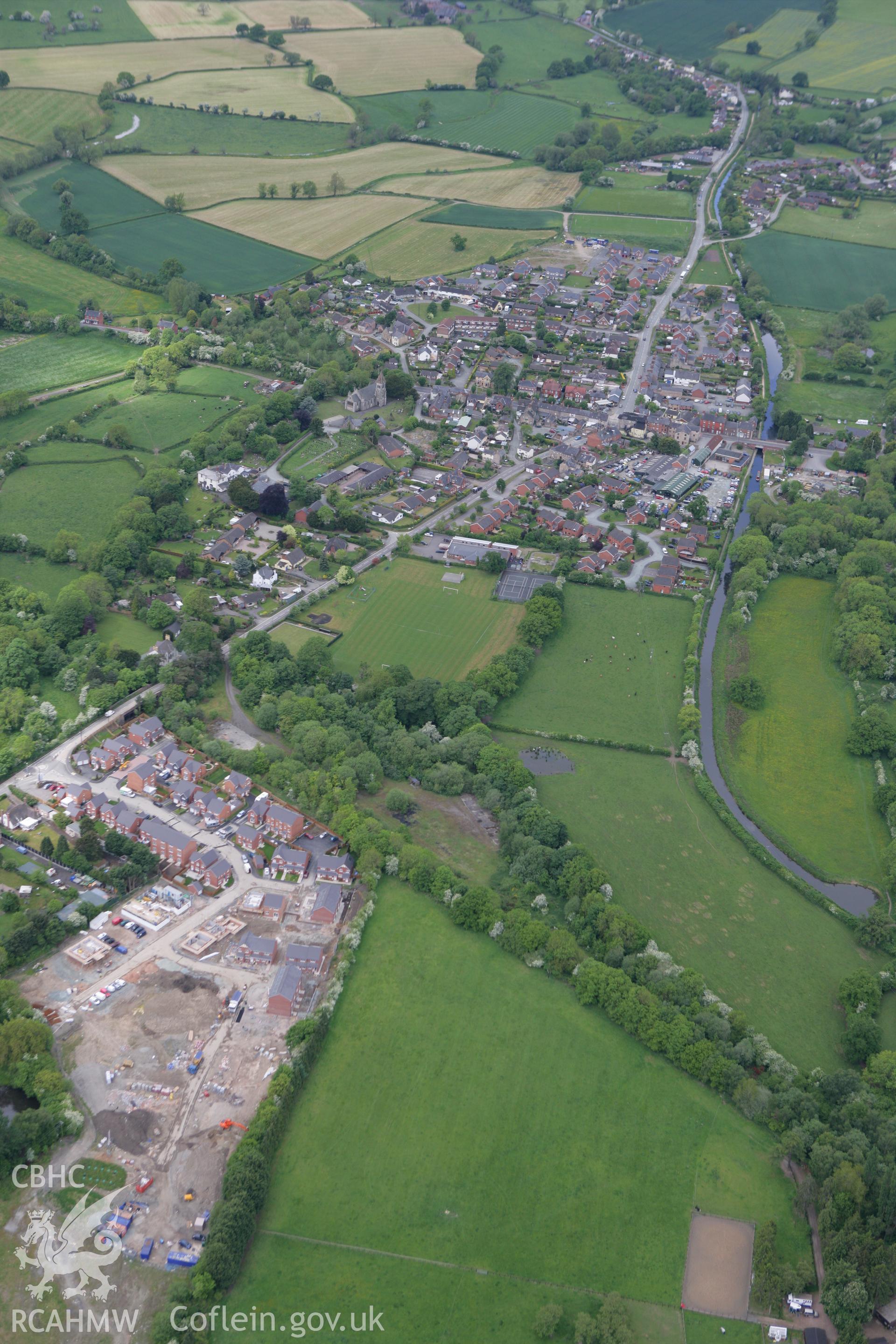 RCAHMW colour oblique photograph of Llanymynech village. Taken by Toby Driver on 27/05/2010.