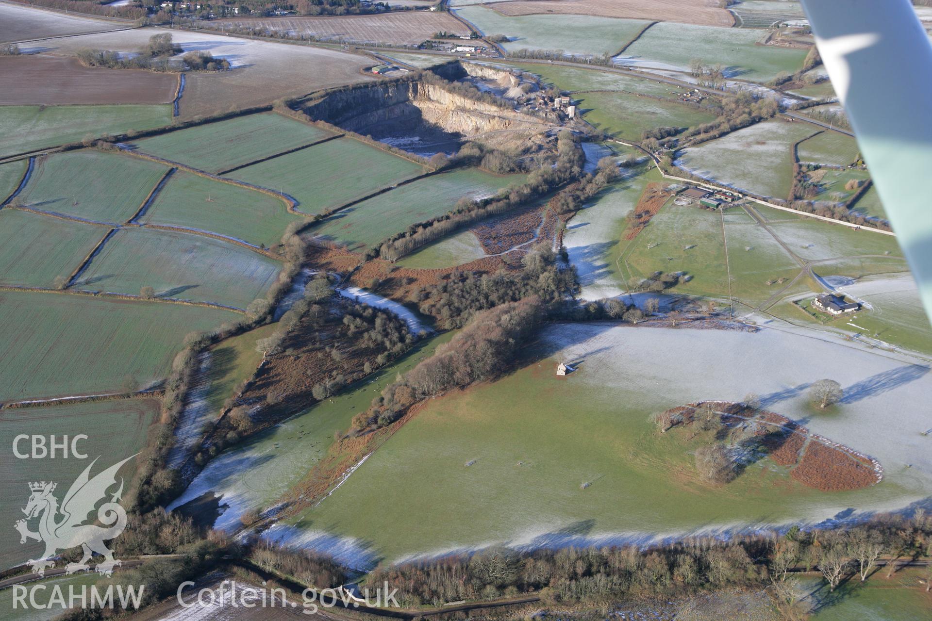 RCAHMW colour oblique photograph of Landscape looking north-west towards Pant y Ffynnon quarry, with ruined cottage. Taken by Toby Driver on 08/12/2010.