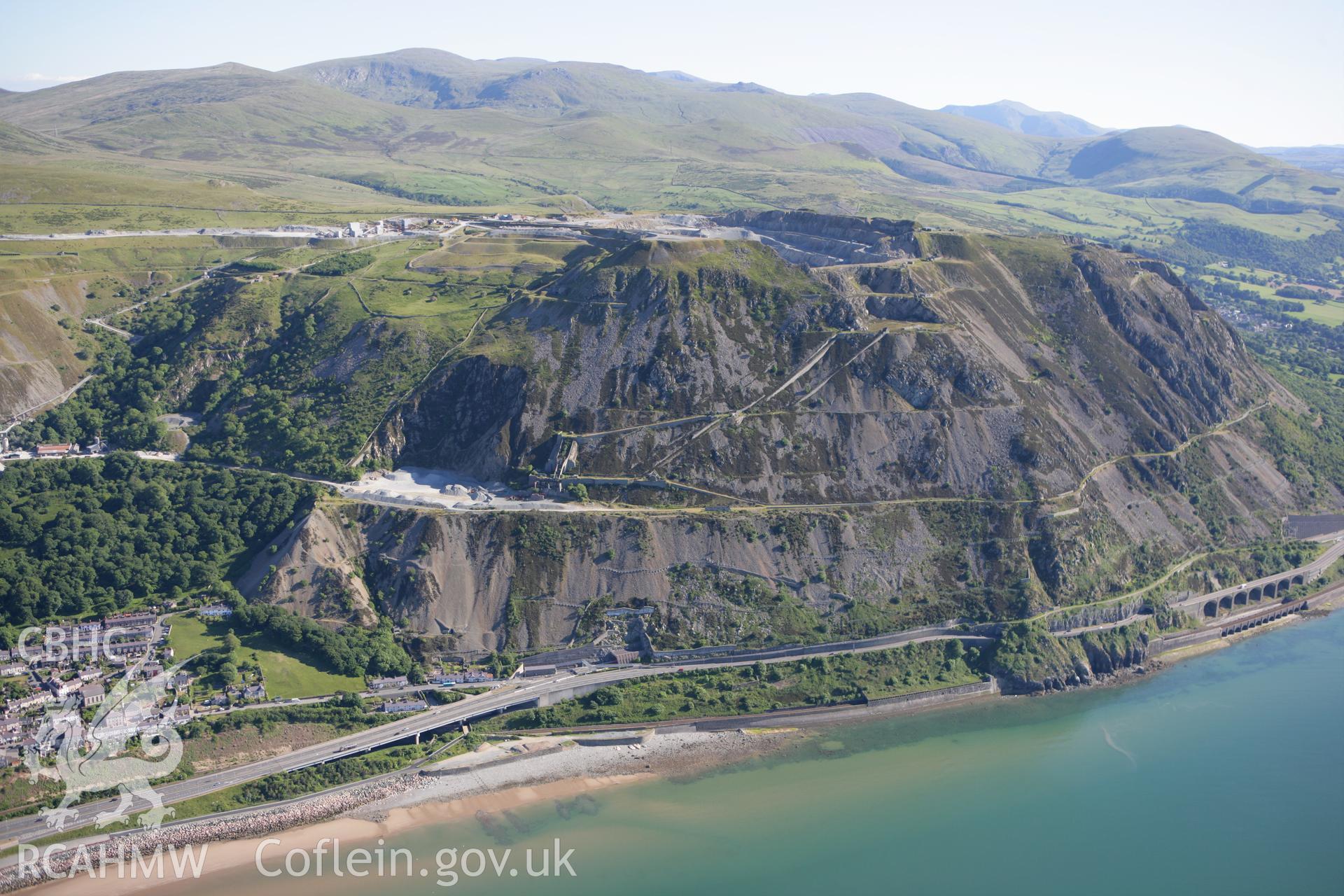 RCAHMW colour oblique photograph of Penmaenmawr Stone Quarry. Taken by Toby Driver on 16/06/2010.