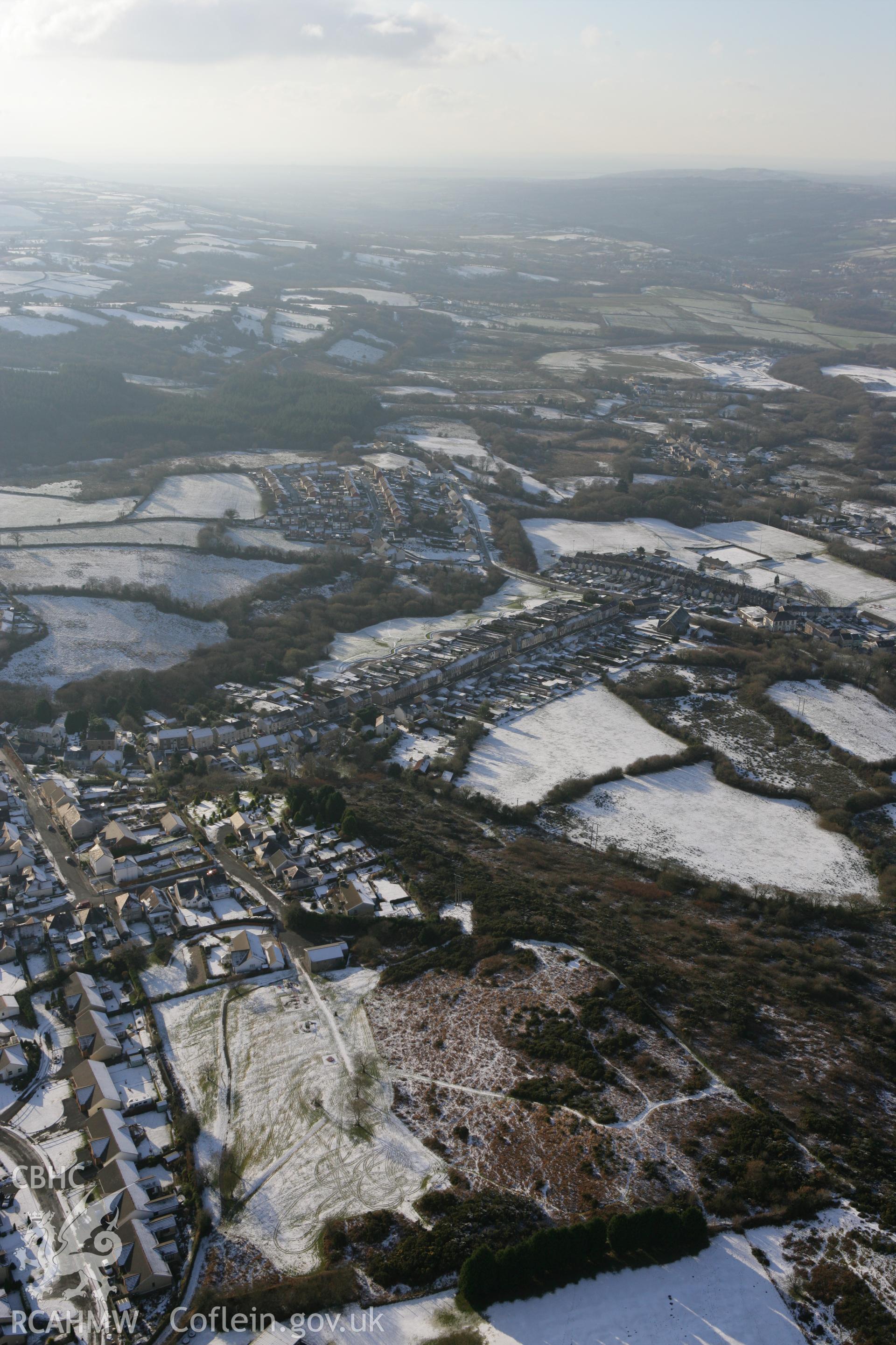 RCAHMW colour oblique photograph of Tumble town from the north-east. Taken by Toby Driver on 01/12/2010.