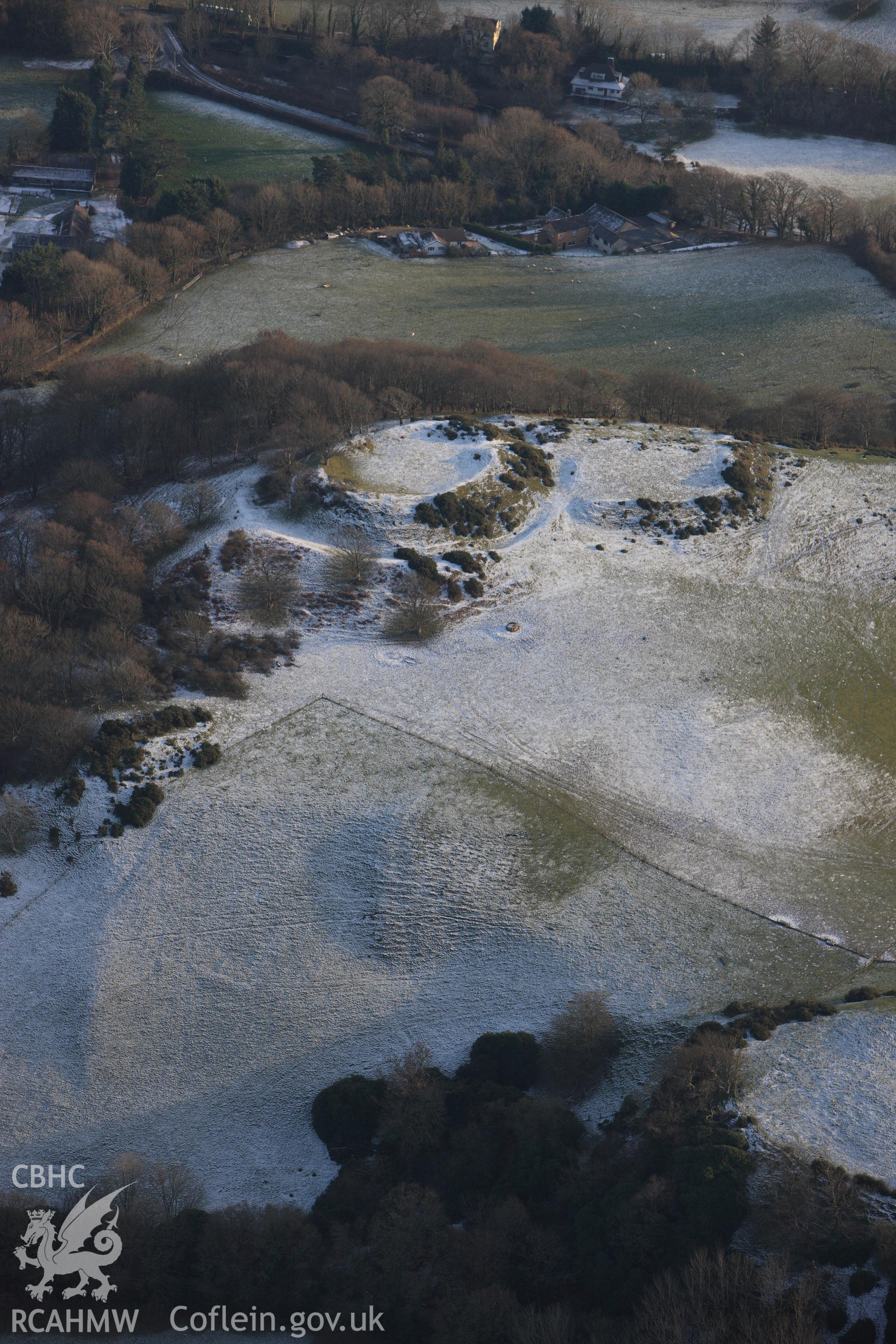RCAHMW colour oblique photograph of Castell Tan y Castell, with snow. Taken by Toby Driver on 02/12/2010.