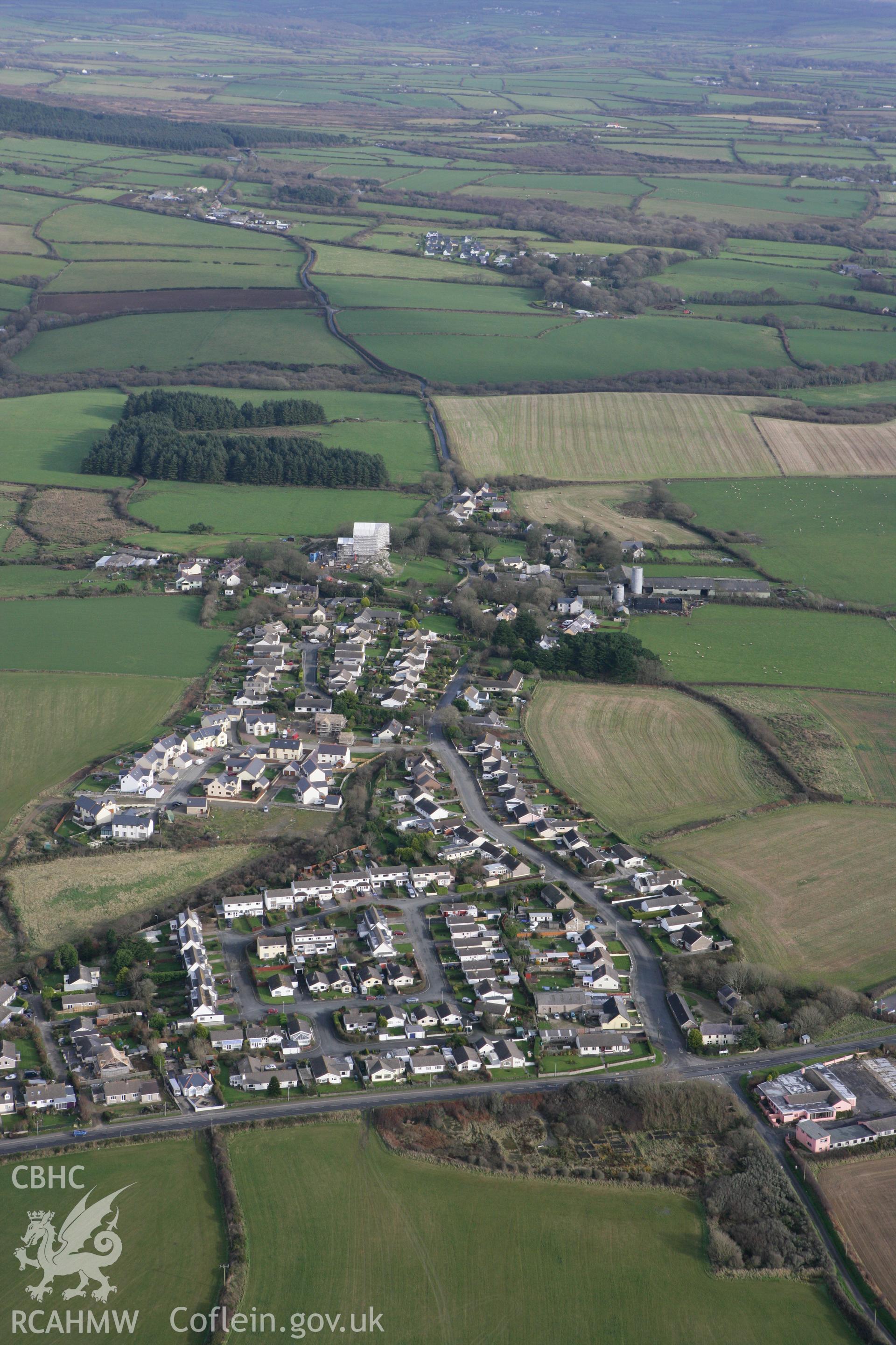 RCAHMW colour oblique photograph of Roch village, with Roch Castle, from the west. Taken by Toby Driver on 16/11/2010.