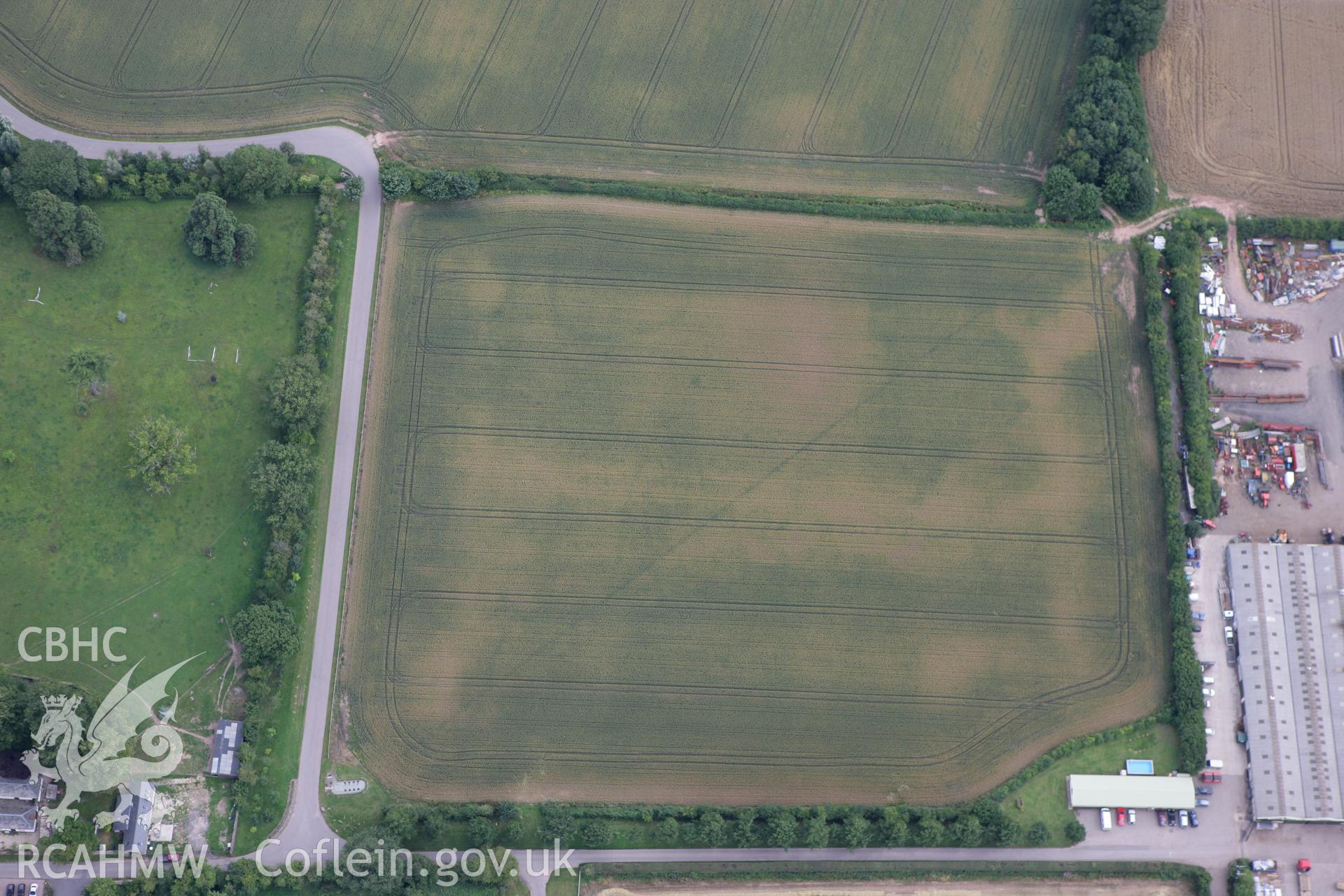 RCAHMW colour oblique photograph of Llancayo Farm Cropmark Enclosures. Taken by Toby Driver on 29/07/2010.