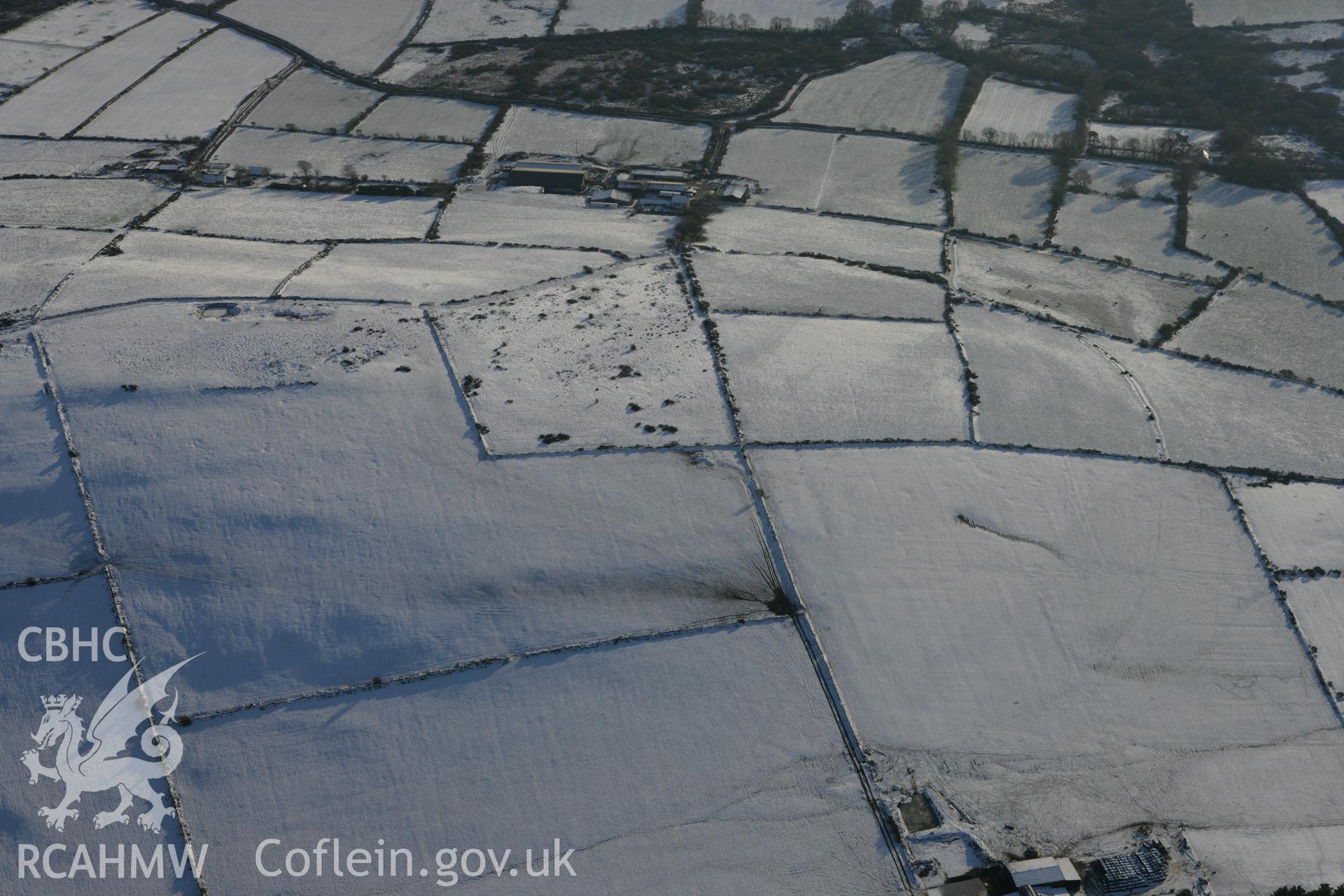 RCAHMW colour oblique photograph of Mynydd Bach, showing possible prehistoric enclosure. Taken by Toby Driver on 01/12/2010.