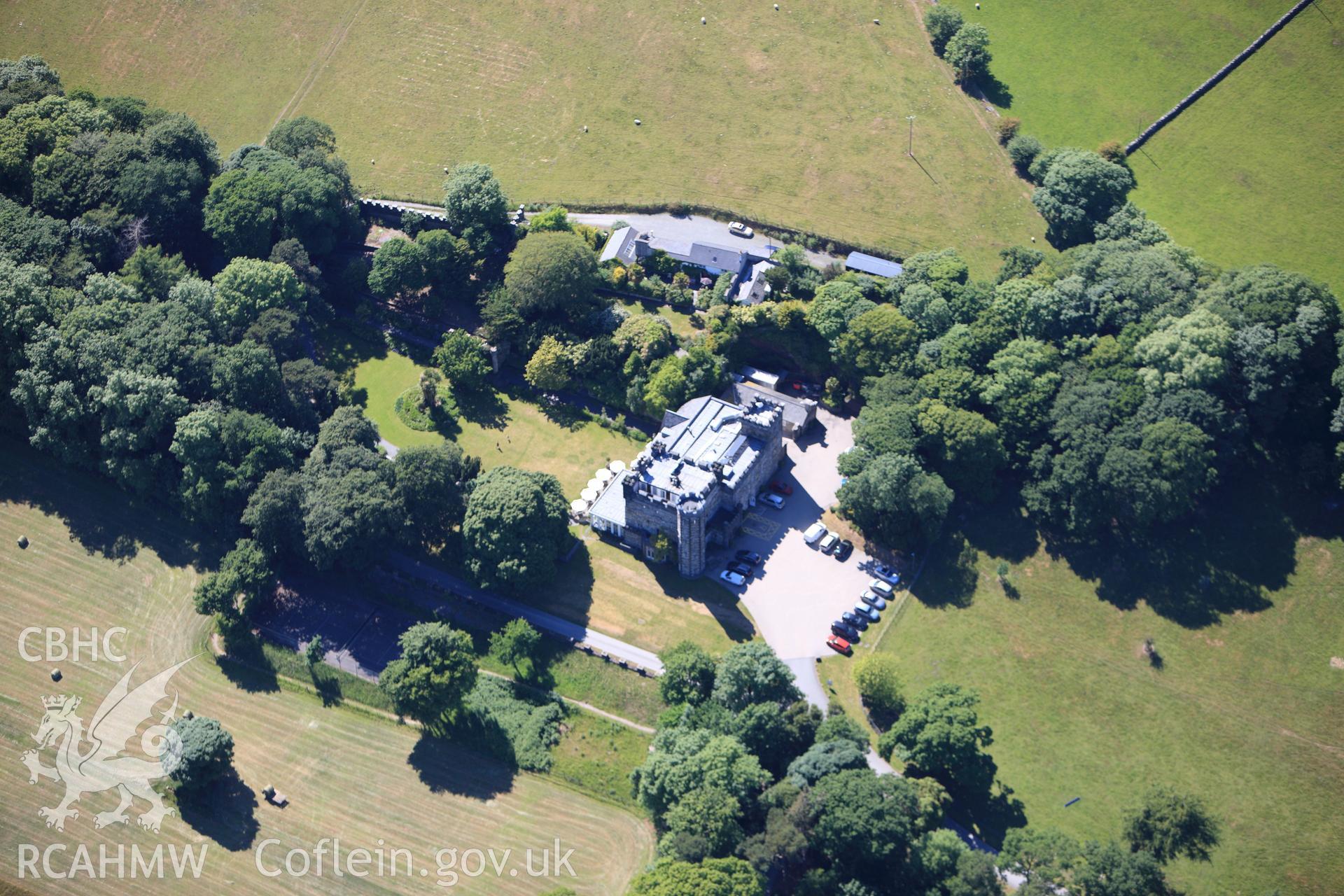 RCAHMW colour oblique photograph of Castell Deudraeth (Castle Deudraeth). Taken by Toby Driver on 16/06/2010.