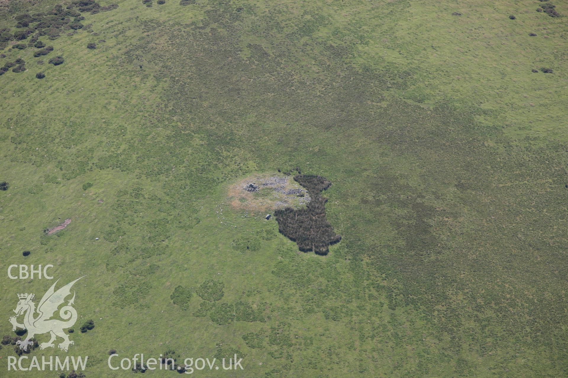 RCAHMW colour oblique photograph of Pen Cad Cymry Cairn. Taken by Toby Driver on 16/06/2010.