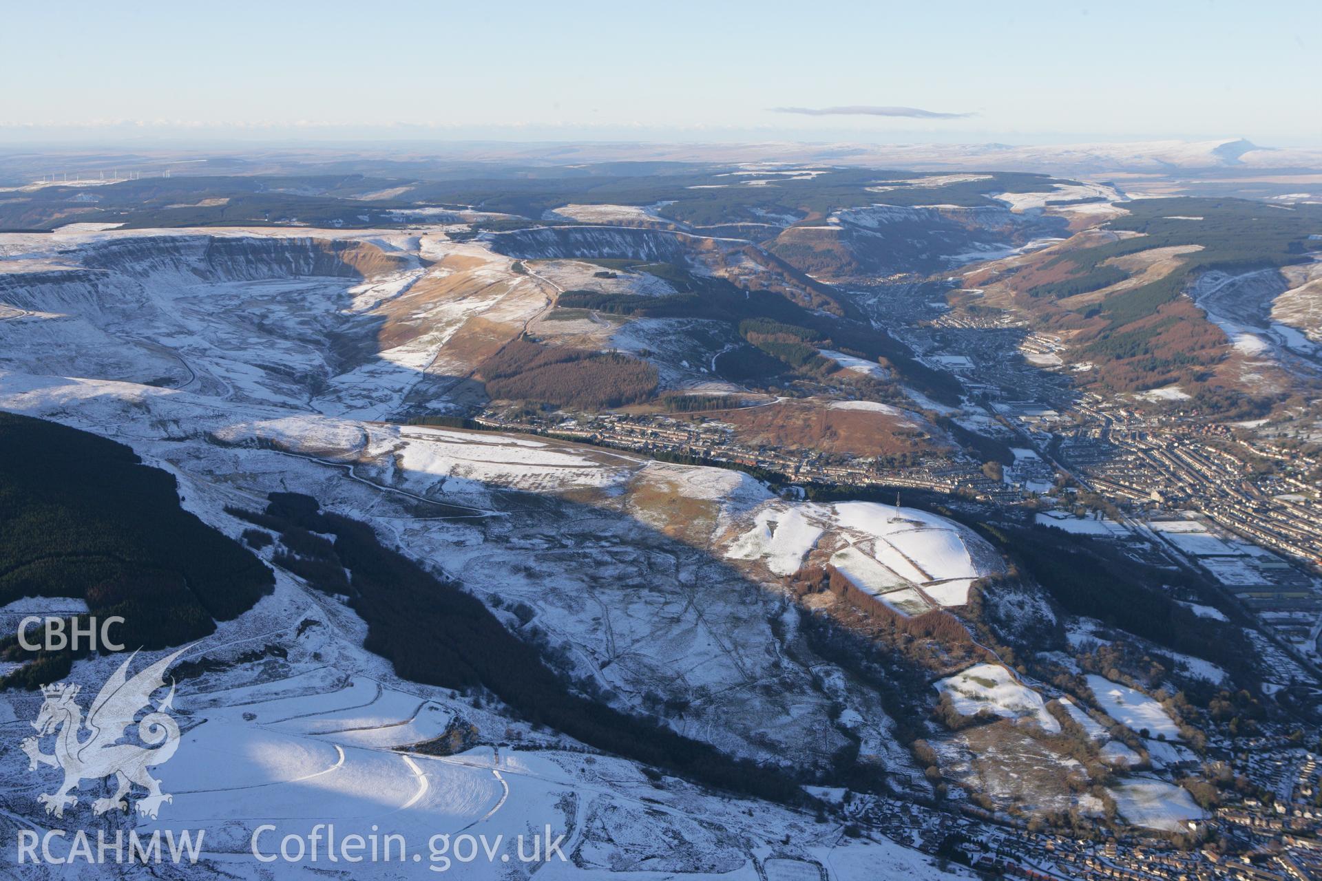 RCAHMW colour oblique photograph of Ton Pentre and Maendy Camp, from the south-east. Taken by Toby Driver on 08/12/2010.