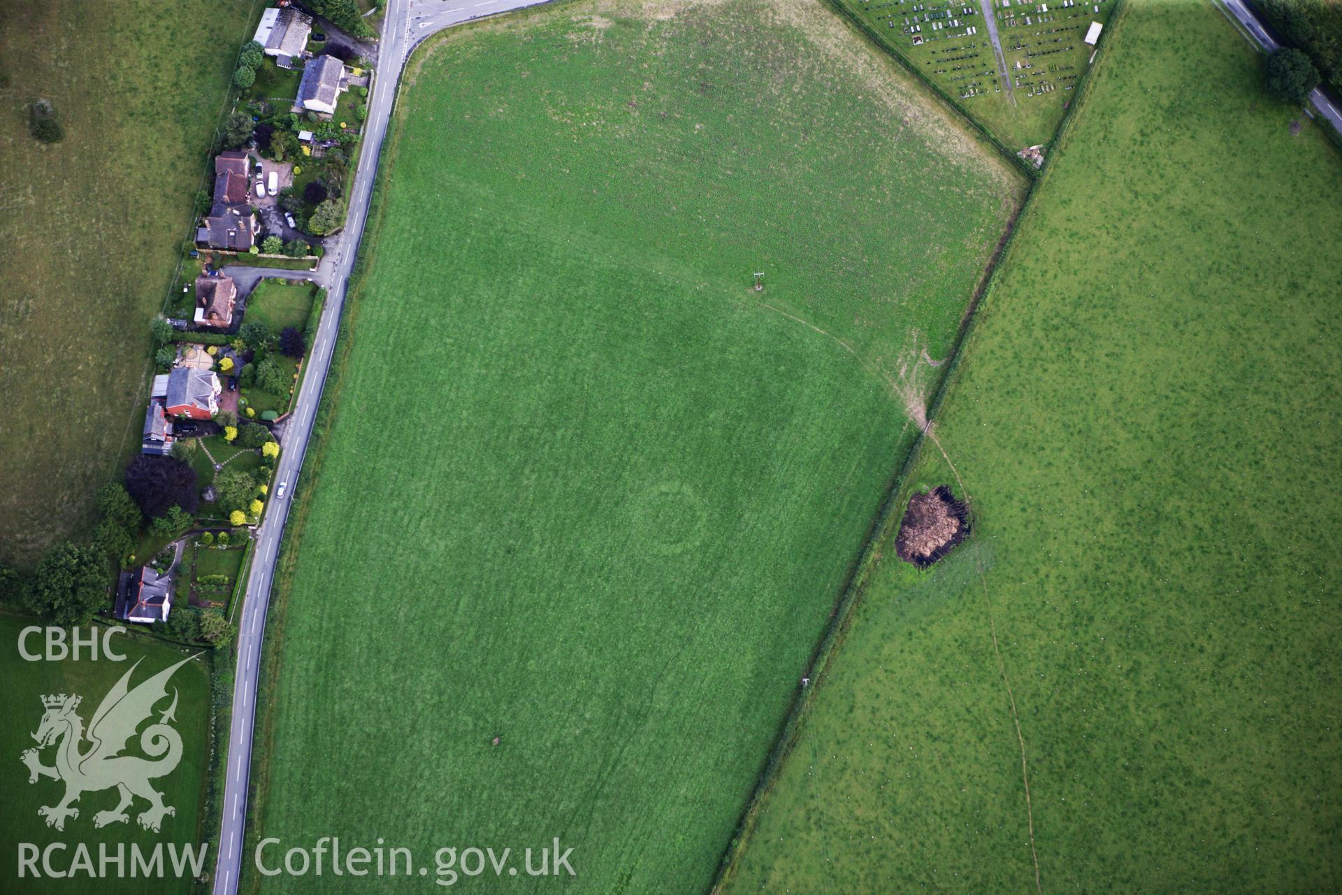 RCAHMW colour oblique photograph of Llanrhaedr-ym-Mochnant Crop Marks West of Meusydd Smithy. Taken by Toby Driver on 21/07/2010.