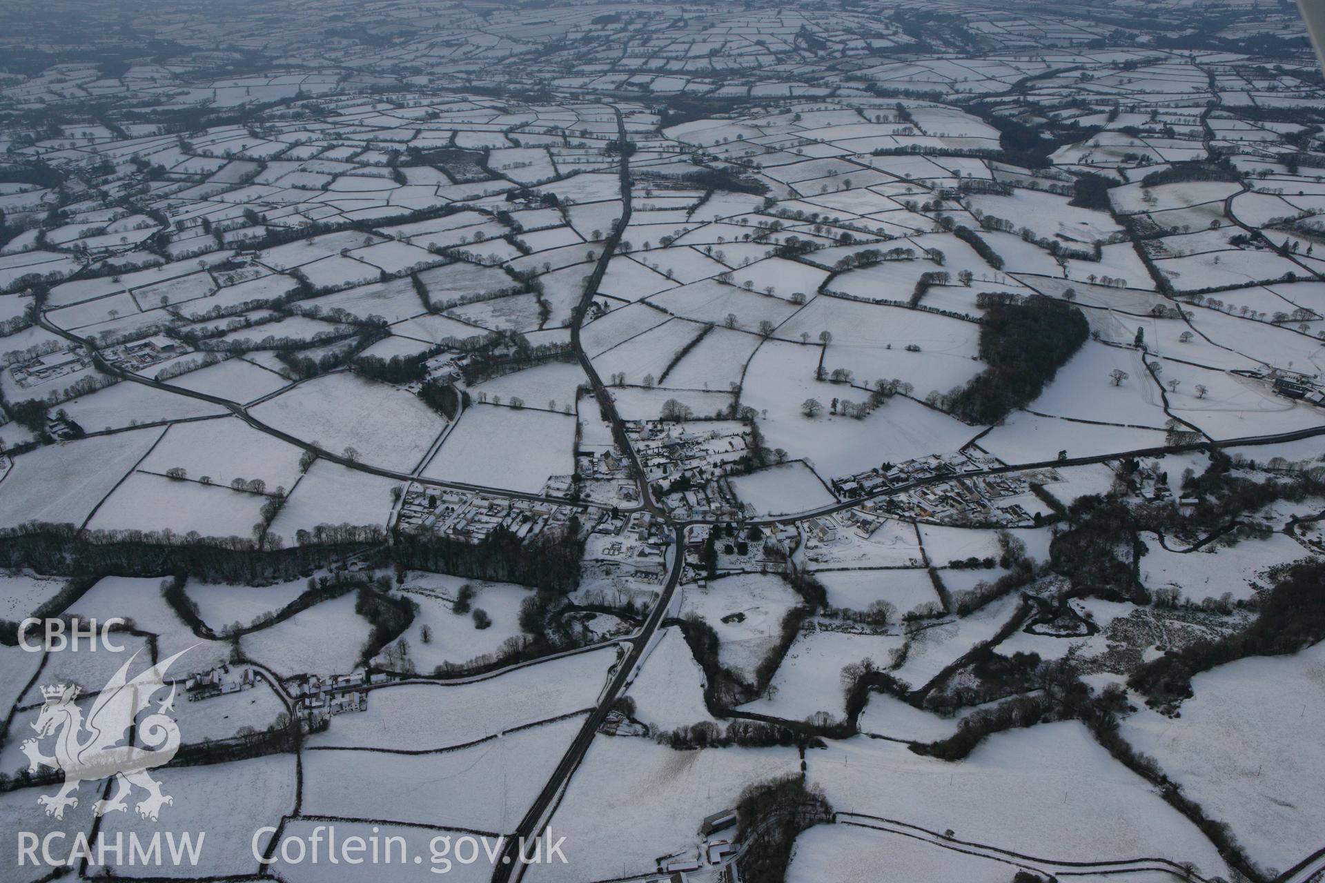 RCAHMW colour oblique photograph of Llanwnnen, view from the east. Taken by Toby Driver on 02/12/2010.
