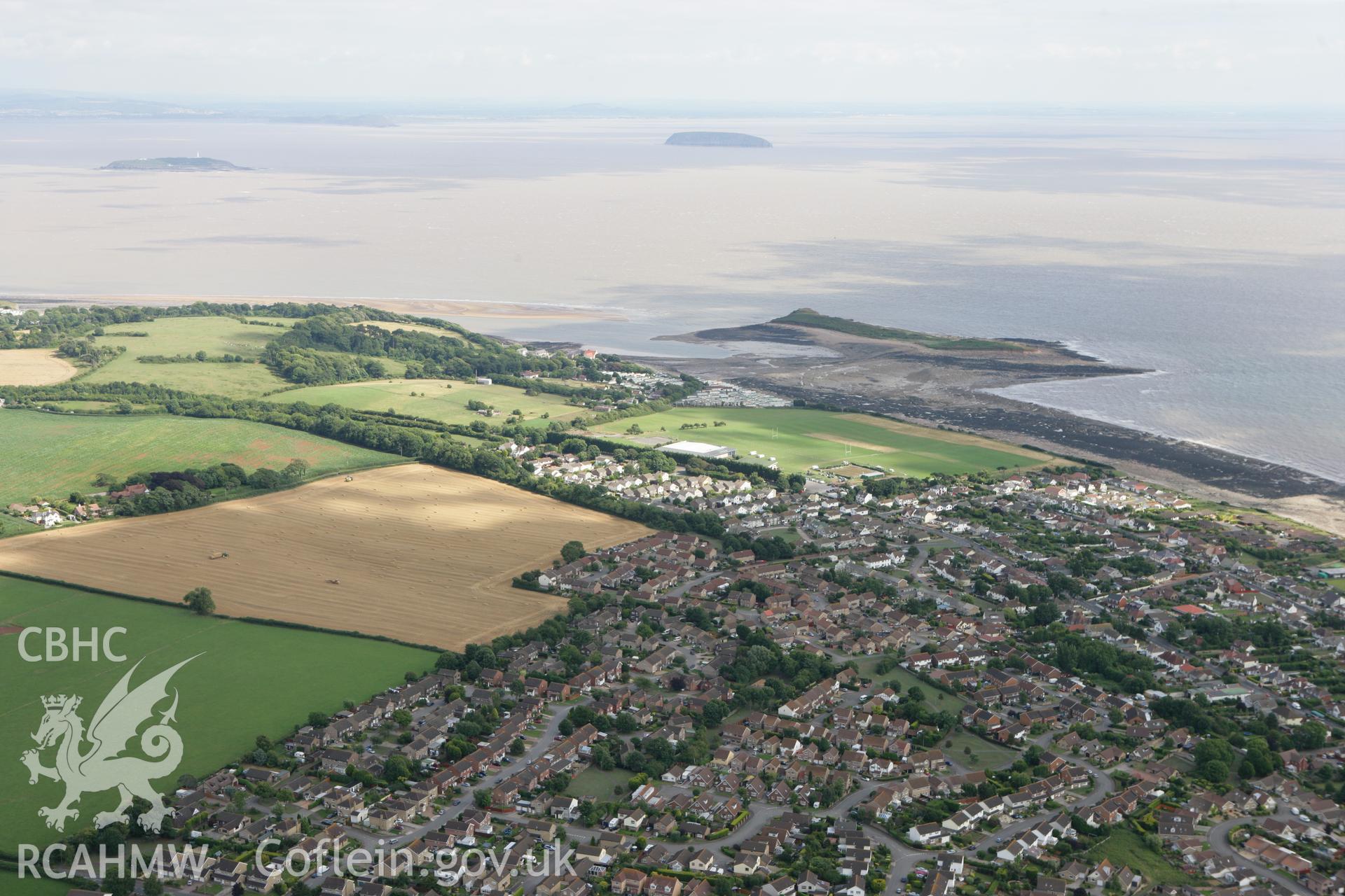 RCAHMW colour oblique photograph of Sully town, looking south-east towards Sully Island. Taken by Toby Driver on 29/07/2010.