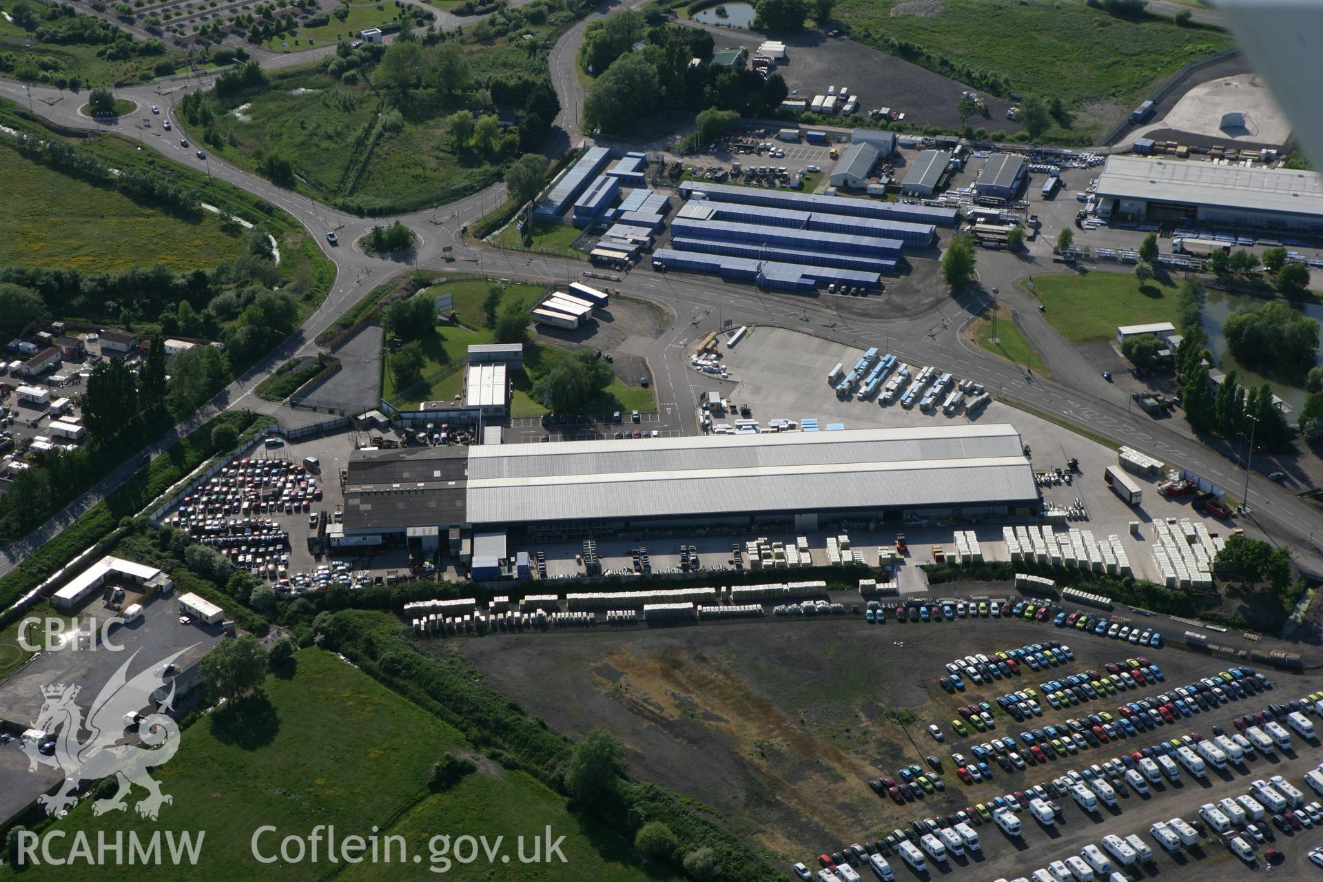 RCAHMW colour oblique photograph of Wentloog Industrial Park dispersal sheds. Taken by Toby Driver on 24/05/2010.