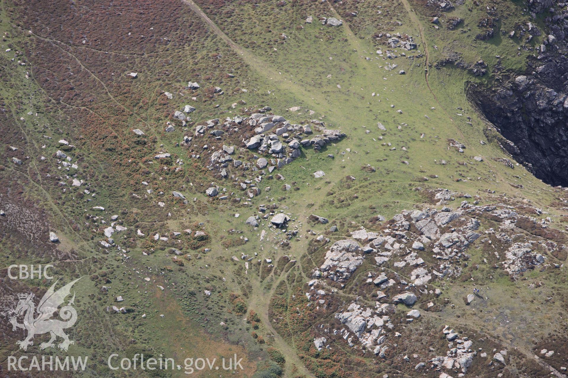 RCAHMW colour oblique photograph of Coetan Arthur Burial Chamber, St David's Head. Taken by Toby Driver on 09/09/2010.