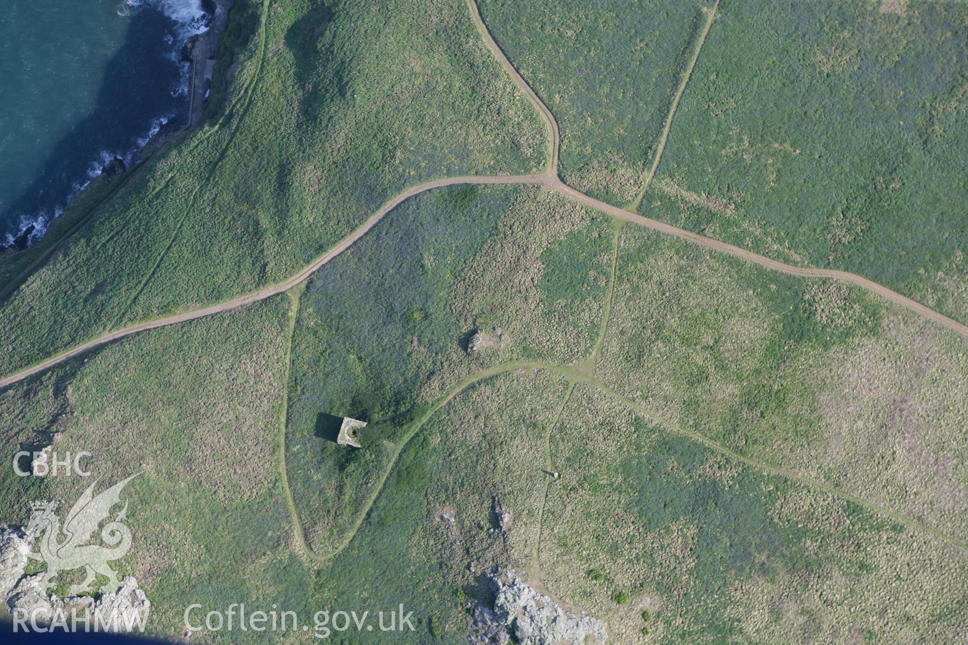RCAHMW colour oblique photograph of Skomer Island, east, with lime kiln. Taken by Toby Driver on 25/05/2010.