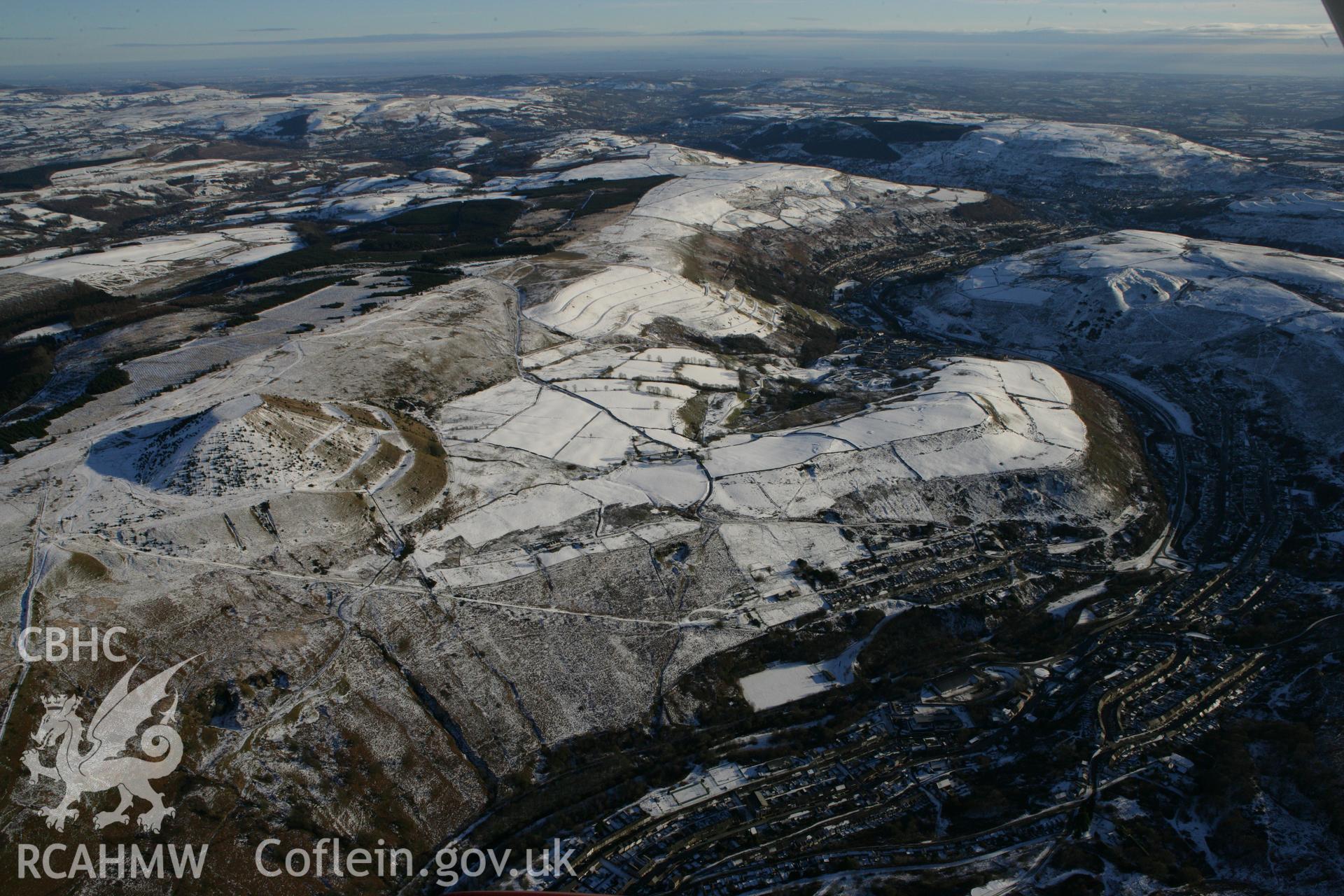 RCAHMW colour oblique photograph of Pendyrys colliery and tips above Tylorstown, looking south. Taken by Toby Driver on 08/12/2010.