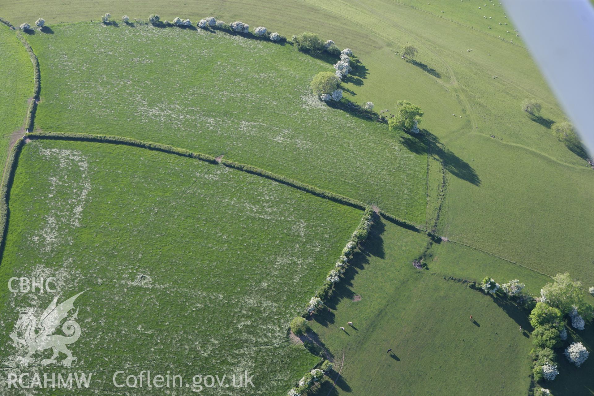RCAHMW colour oblique photograph of Flemingstone enclosure. Taken by Toby Driver on 24/05/2010.