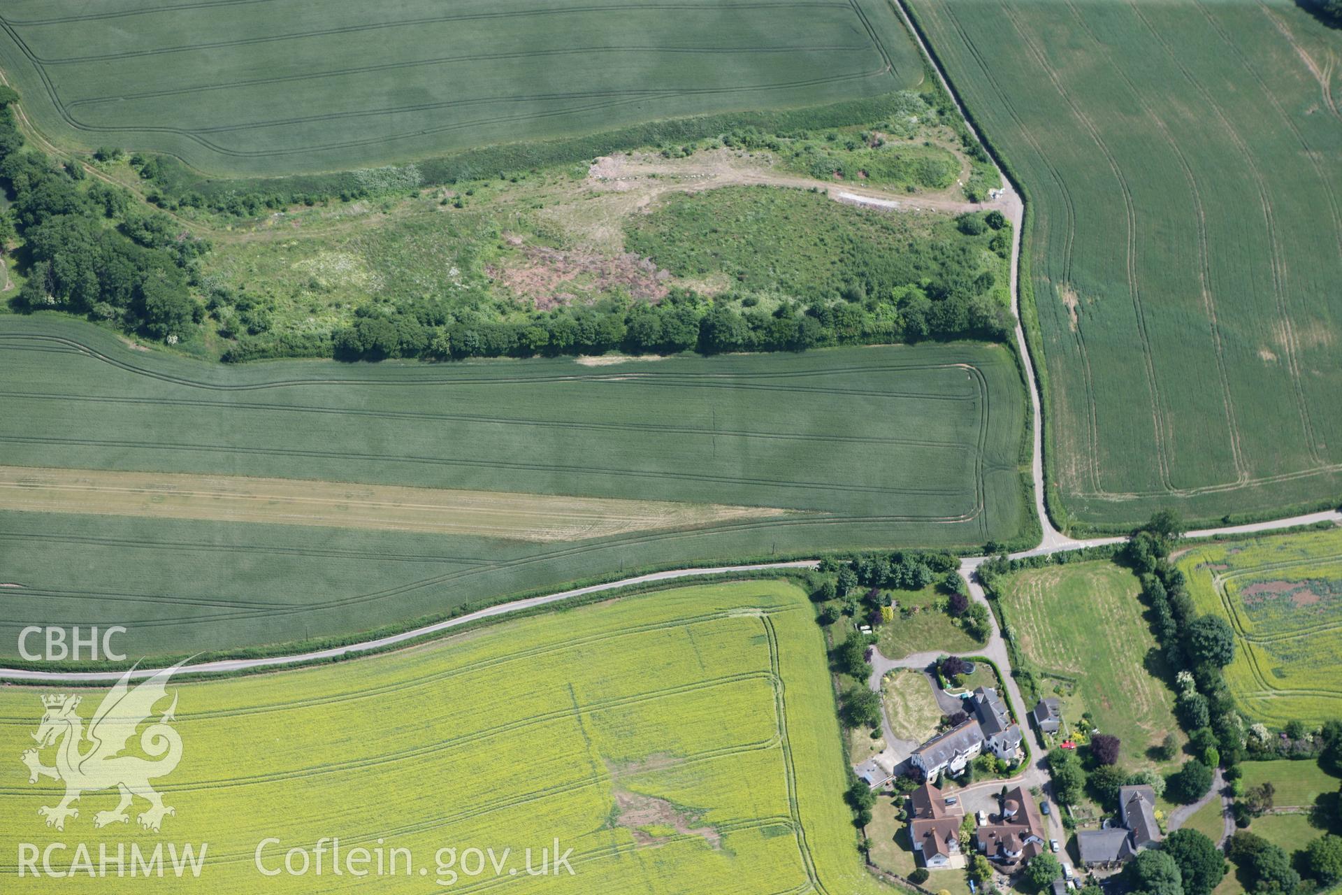 RCAHMW colour oblique photograph of Roman Enclosure cropmarks at The Hollies. Taken by Toby Driver on 21/06/2010.