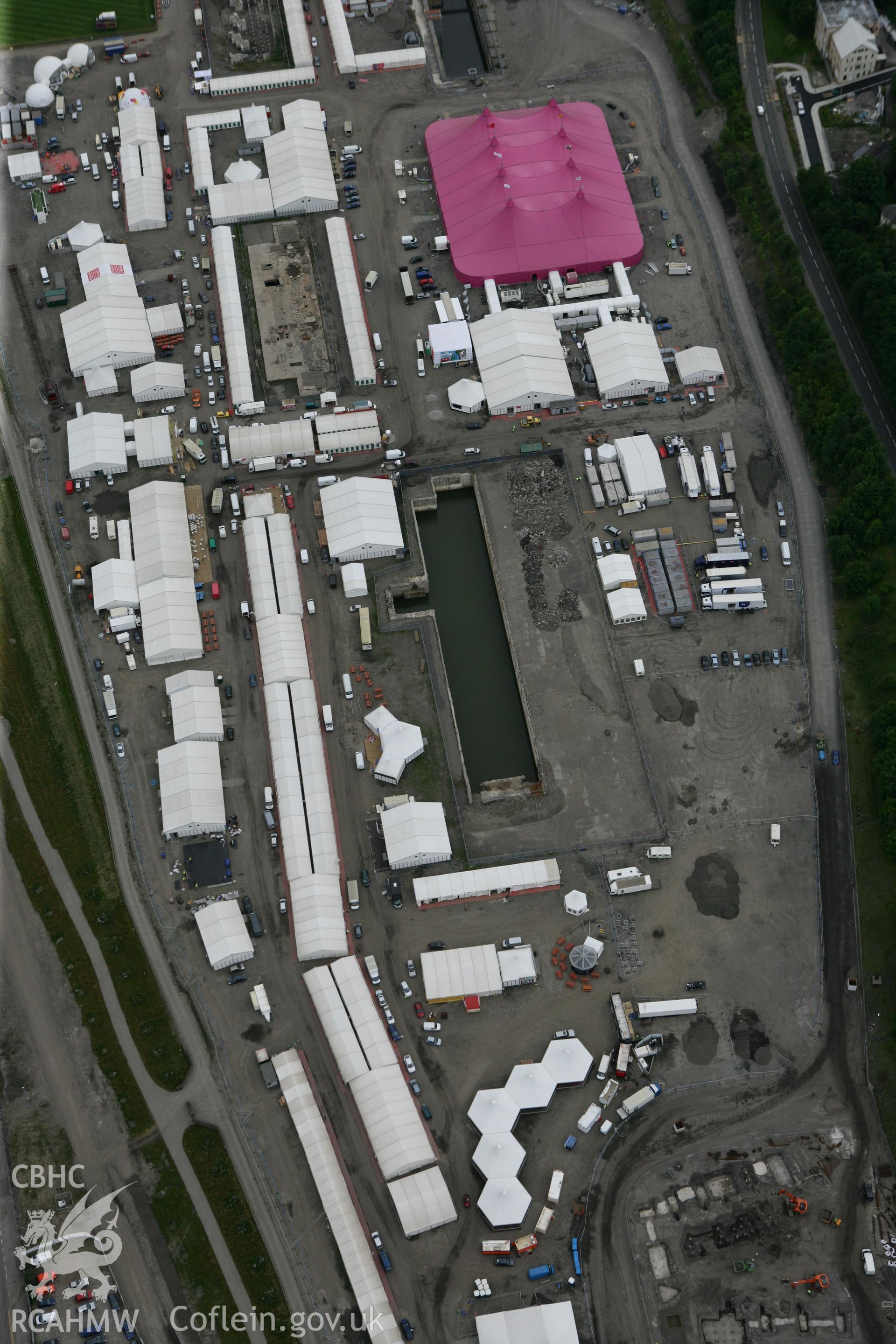 RCAHMW colour oblique photograph of National Eisteddfod of Wales 2010, on the site of the Ebbw Vale Steelworks. Taken by Toby Driver on 29/07/2010.