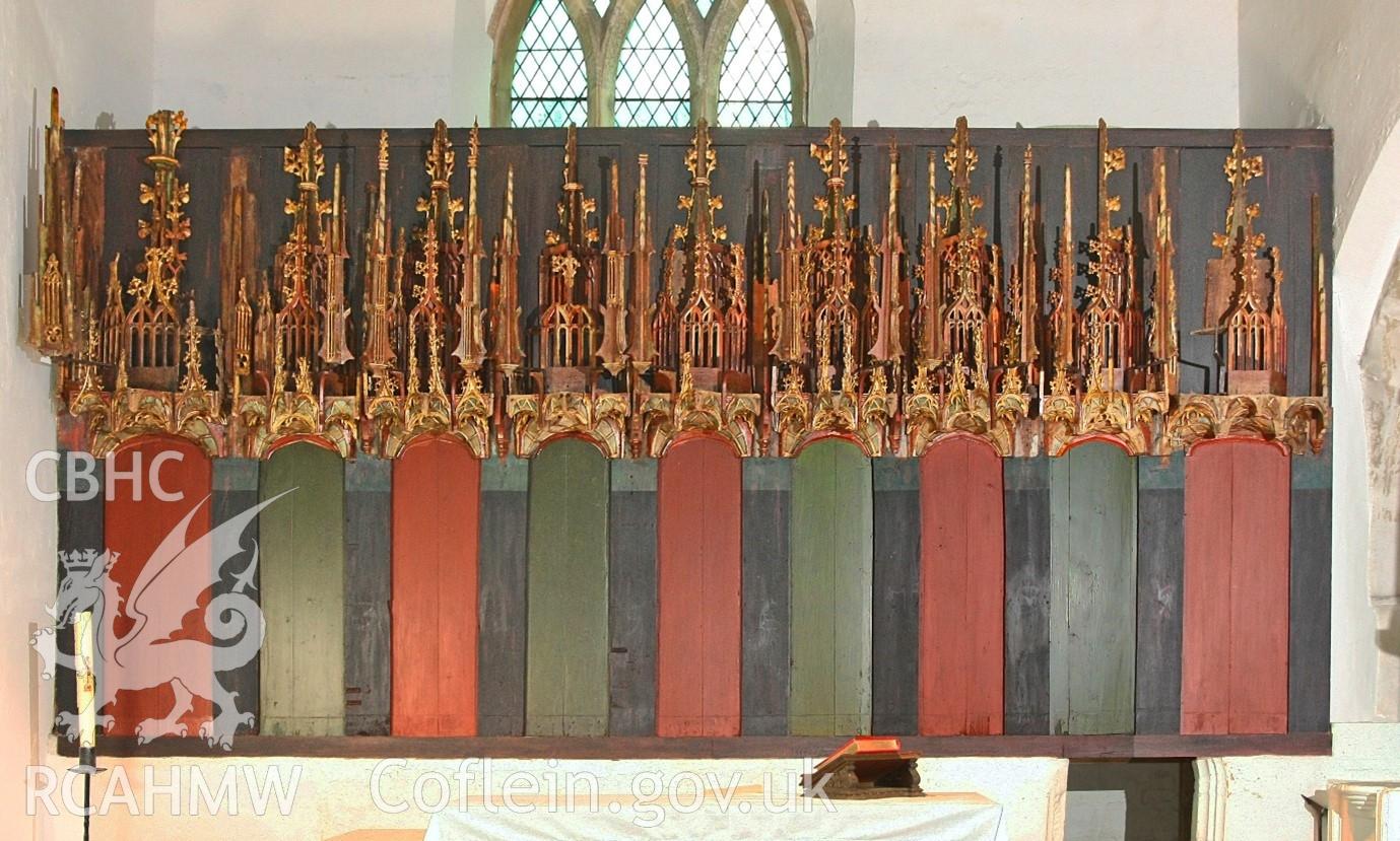 Restored reredos, RCAHMW photograph by Martin Crampin, 30 April 2021. As published in RCAHMW volume, 'Temlau Peintiedig: Murluniau a Chroglenni yn Eglwysi Cymru, 1200–1800 / Painted Temples: Wallpaintings and Rood-screens in Welsh Churches, 1200–1800.' Figure 3.26, page 108.