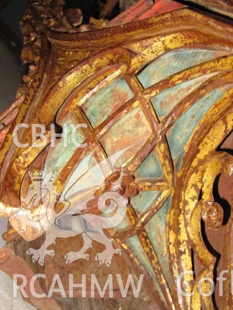 Detail of restored reredos at St Cadoc’s Church, Llancarfan. RCAHMW photograph by Martin Crampin, 30 April 2021, as published in RCAHMW volume, 'Temlau Peintiedig: Murluniau a Chroglenni yn Eglwysi Cymru, 1200–1800 / Painted Temples: Wallpaintings and Rood-screens in Welsh Churches, 1200–1800.'Figure 3.27, page 109.