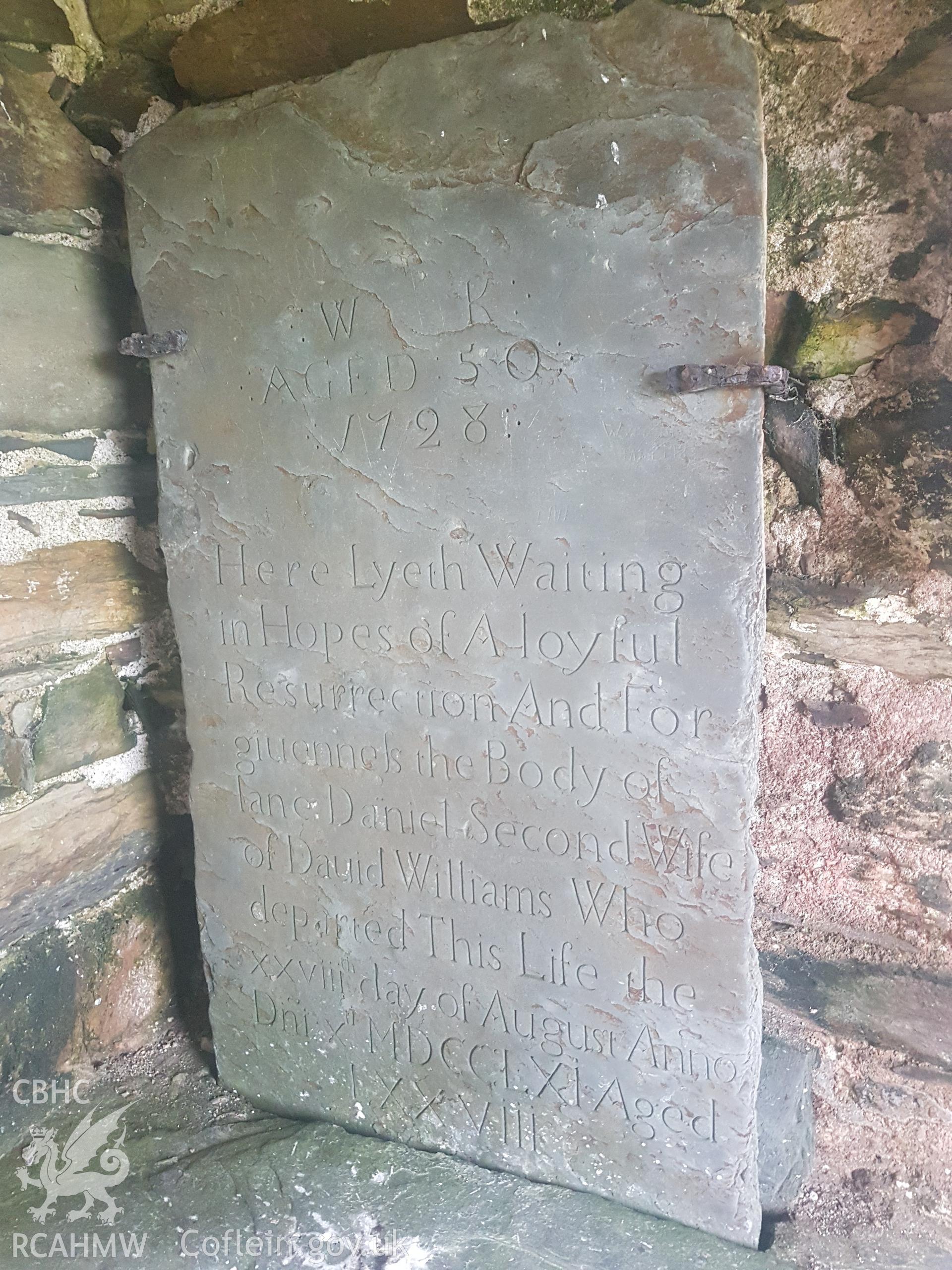 Gravestone in lychgate dated 1728 of Jane Daniel. Photographed by Helen Rowe of RCAHMW on 10th October 2020.