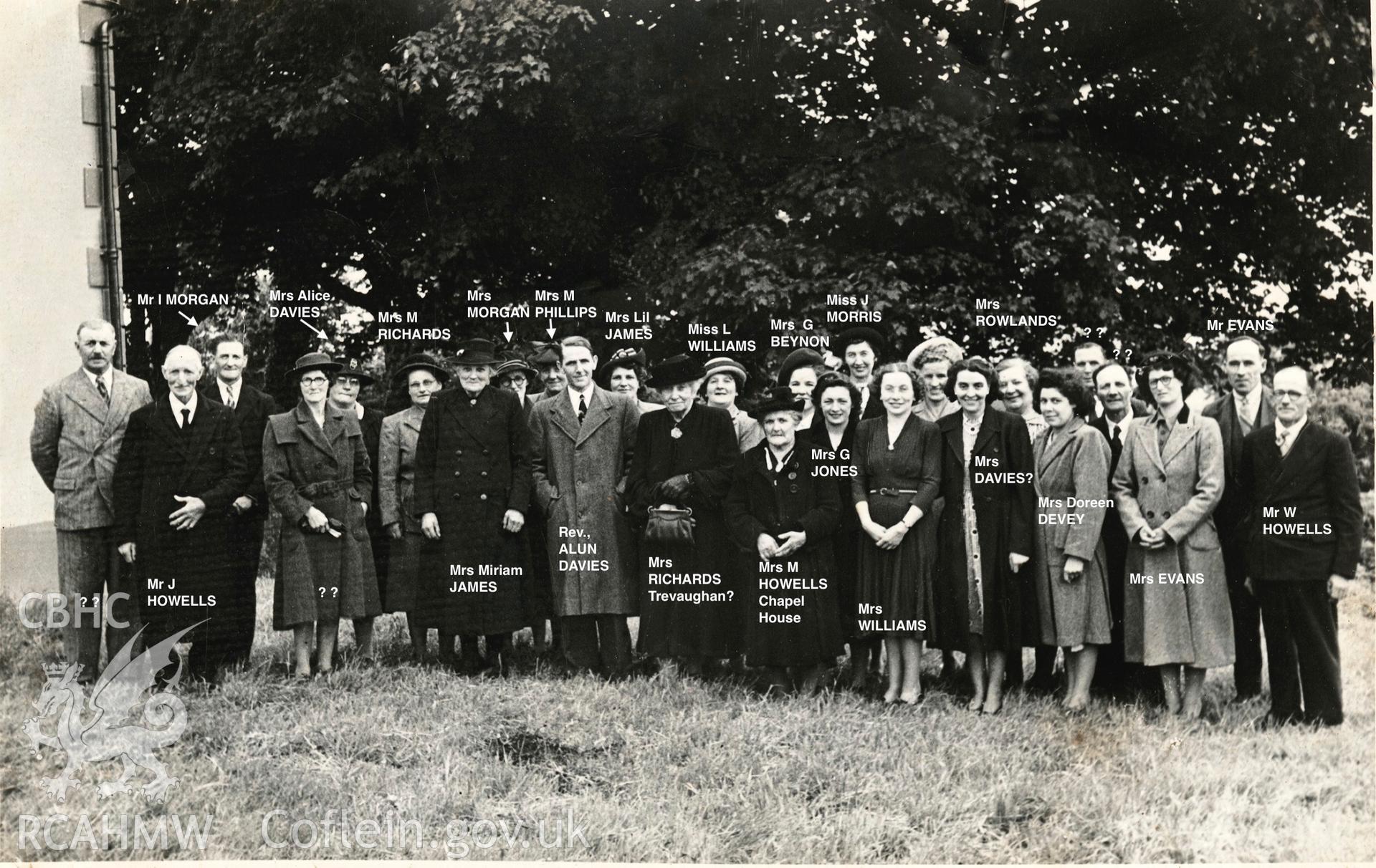 'Photo showing the Bwlchgwynt congregation, in the 1950’s, just outside the Chapel, the Minister the Rev., Alun Davies is present.'