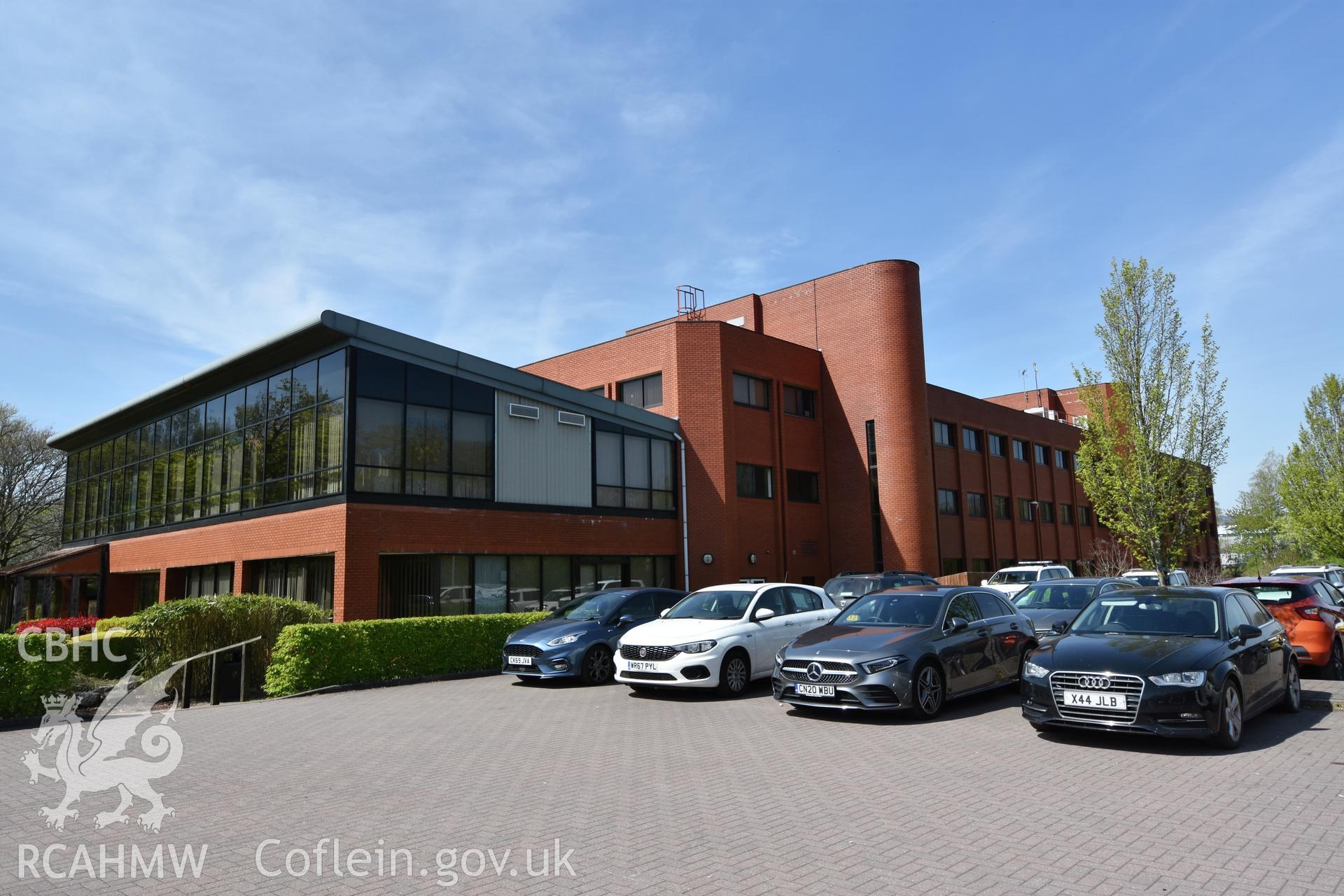 Exterior view of Ferranti Computer Complex and its car park, Ty Coch, Cwmbran, photographed by Susan Fielding of RCAHMW on 23 April 2021.