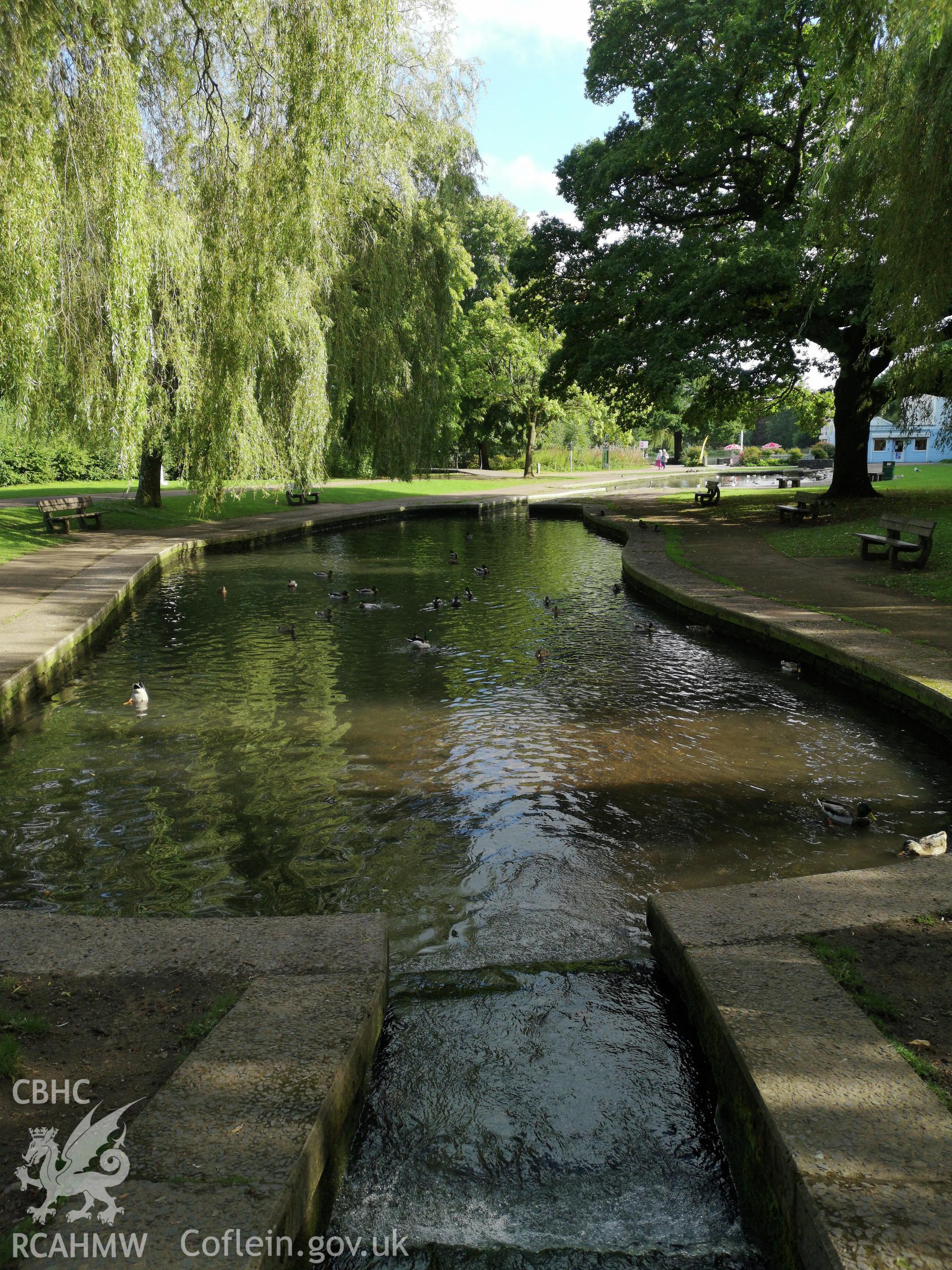 Ornamental running water feature flanked by trees at Cwmbran Park, photographed by Susan Fielding of RCAHMW on 12 September 2019.