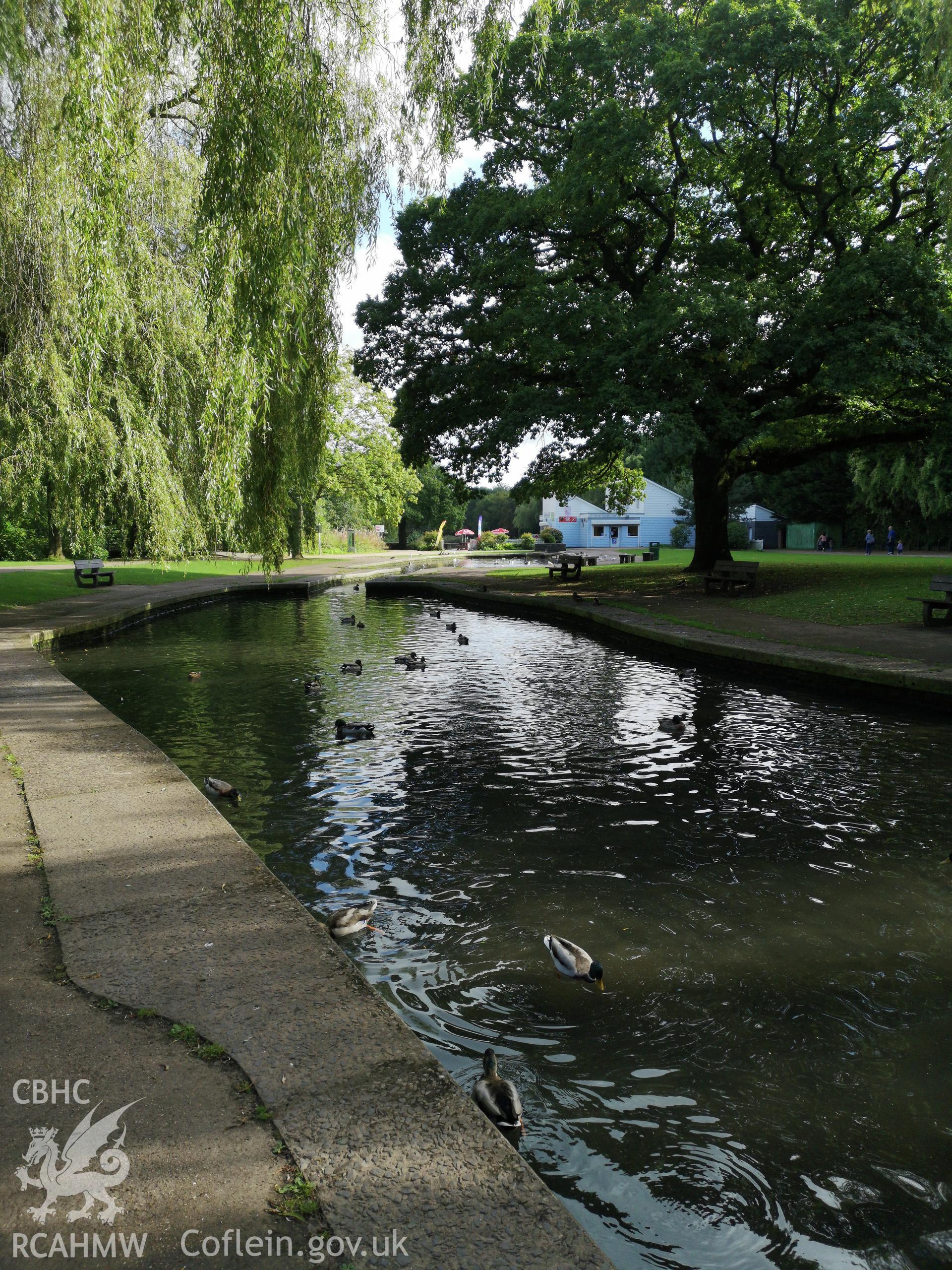 Ornamental running water feature flanked by trees at Cwmbran Park, photographed by Susan Fielding of RCAHMW on 12 September 2019.