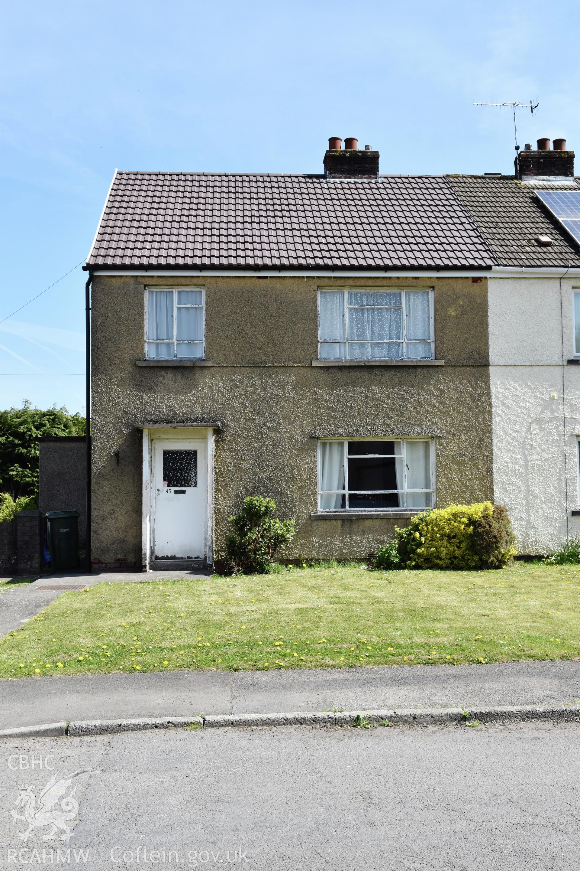 Exterior view showing front elevation of one half of a semi detached Cwmbran Development Corporation House on South Road in the Oakfield Neighbourhood of Cwmbran, photographed by Susan Fielding of RCAHMW between 23 April 2021.