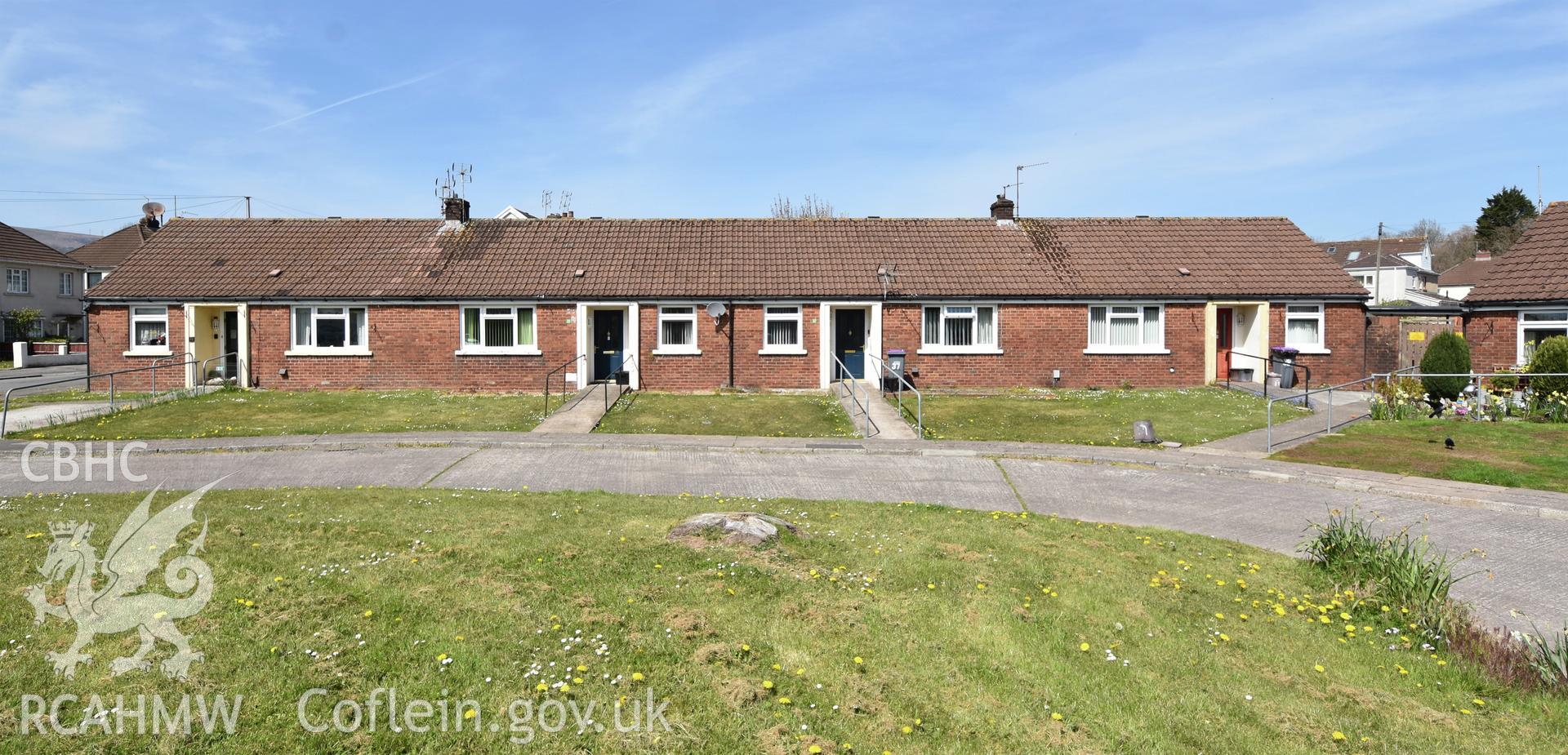 Exterior view showing front elevation of Cwmbran Development Corporation Sheltered Housing Scheme on The Highway in the Oakfield Neighbourhood of Cwmbran, photographed by Susan Fielding of RCAHMW between 23 April 2021.