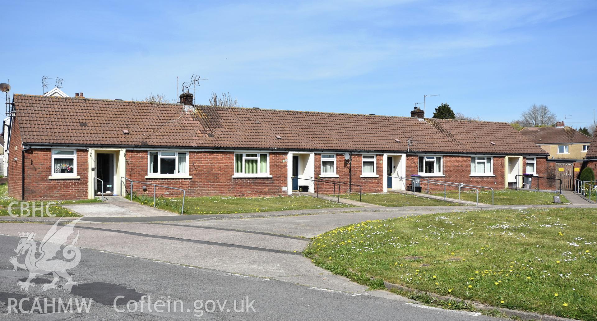 Exterior view showing front elevation of Cwmbran Development Corporation Sheltered Housing Scheme on The Highway in the Oakfield Neighbourhood of Cwmbran, photographed by Susan Fielding of RCAHMW between 23 April 2021.