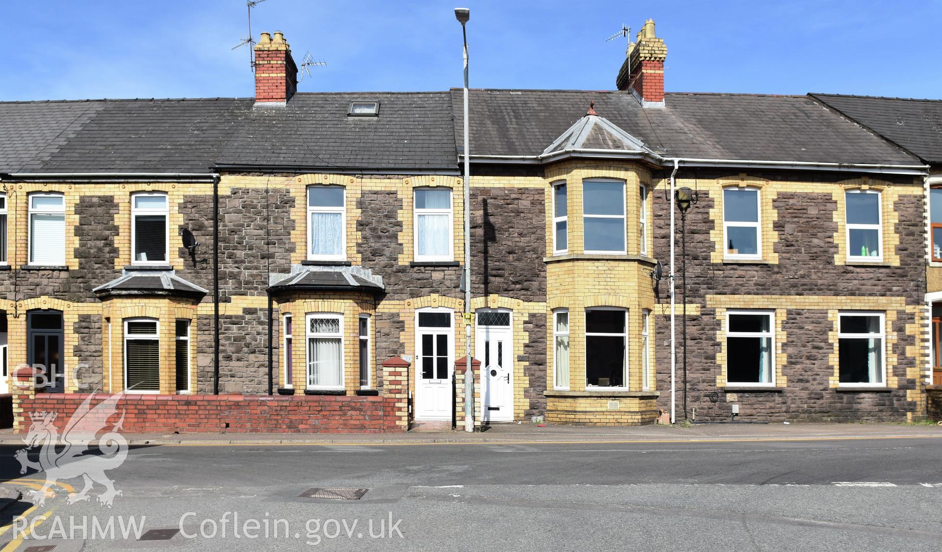 Exterior view showing front elevation of terraced housing on Victoria Street in the Oakfield Neighbourhood of Cwmbran, photographed by Susan Fielding of RCAHMW between 23 April 2021.