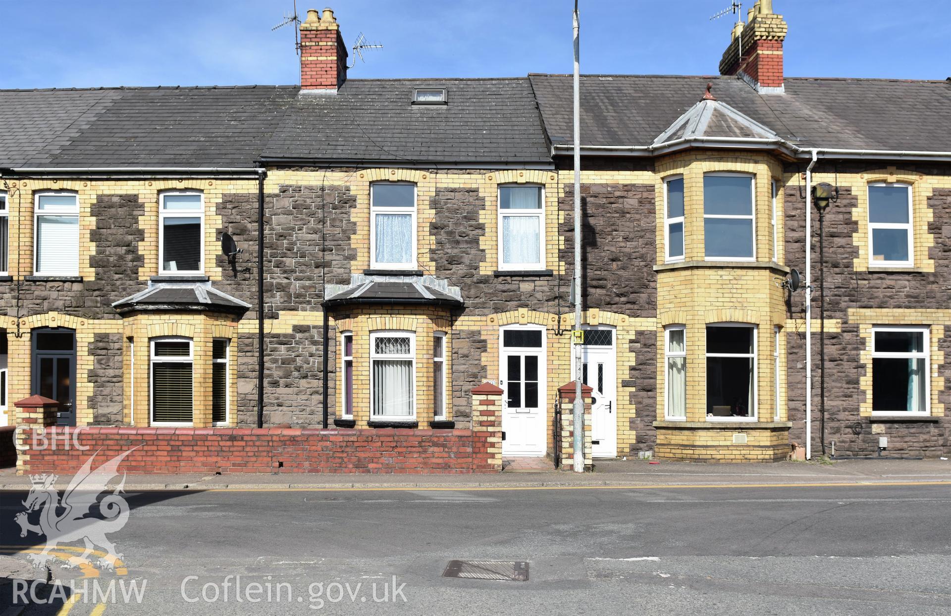 Exterior view showing front elevation of terraced housing on Victoria Street in the Oakfield Neighbourhood of Cwmbran, photographed by Susan Fielding of RCAHMW between 23 April 2021.
