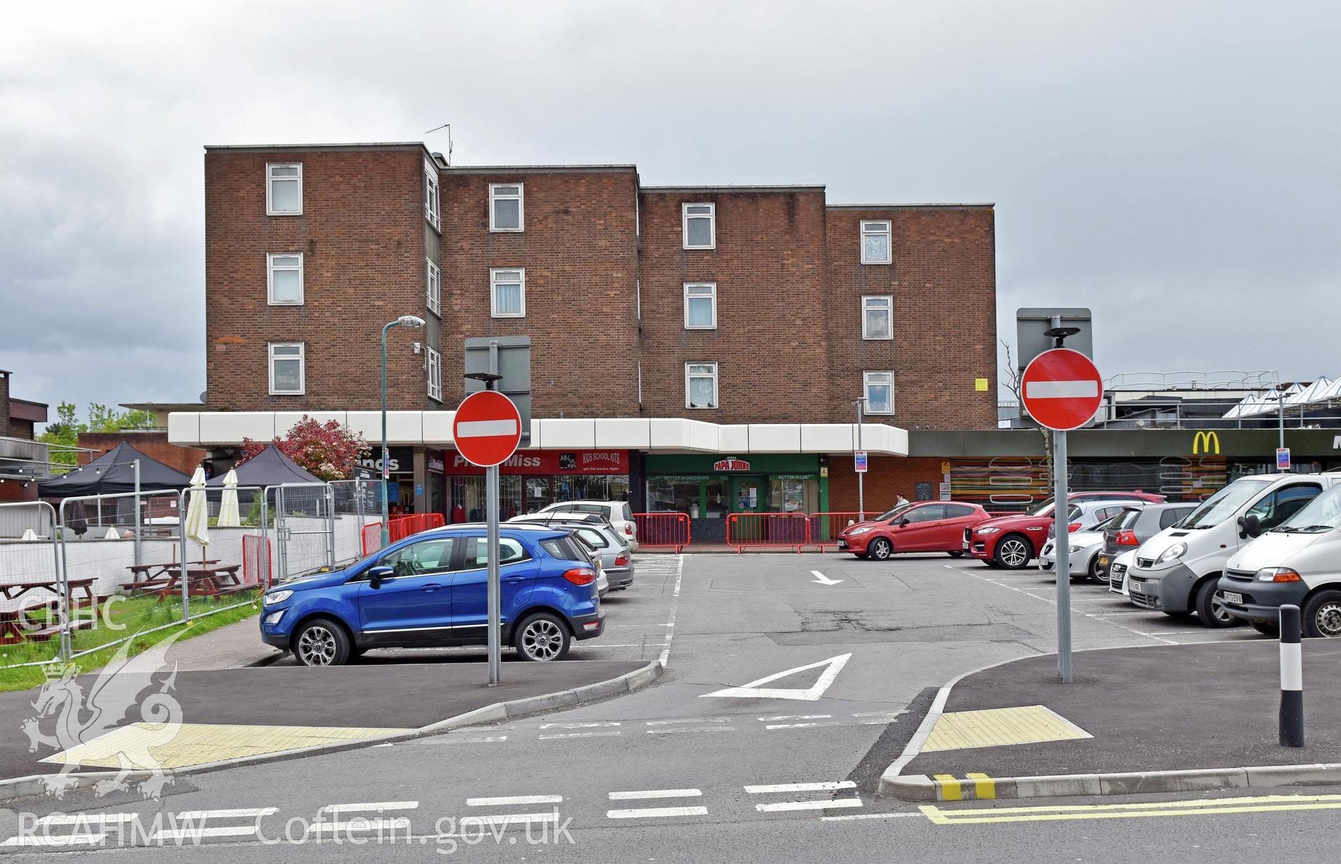 Exterior view of flats and shops in Cwmbran town centre, photographed by Susan Fielding of RCAHMW on 25 May 2021.