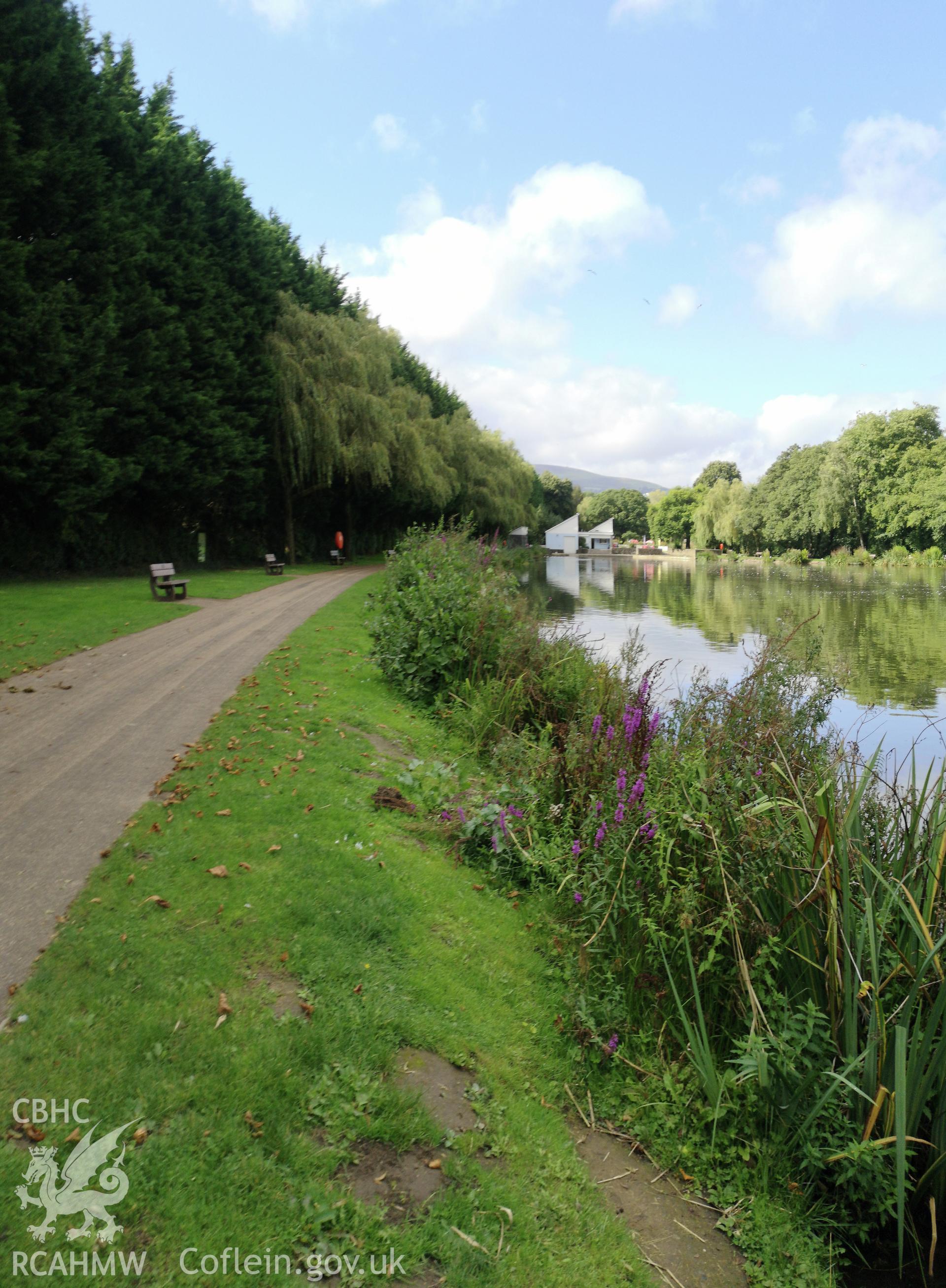 Pathway with benches along the water's edge at Cwmbran Park, photographed by Susan Fielding of RCAHMW on 12 September 2019.