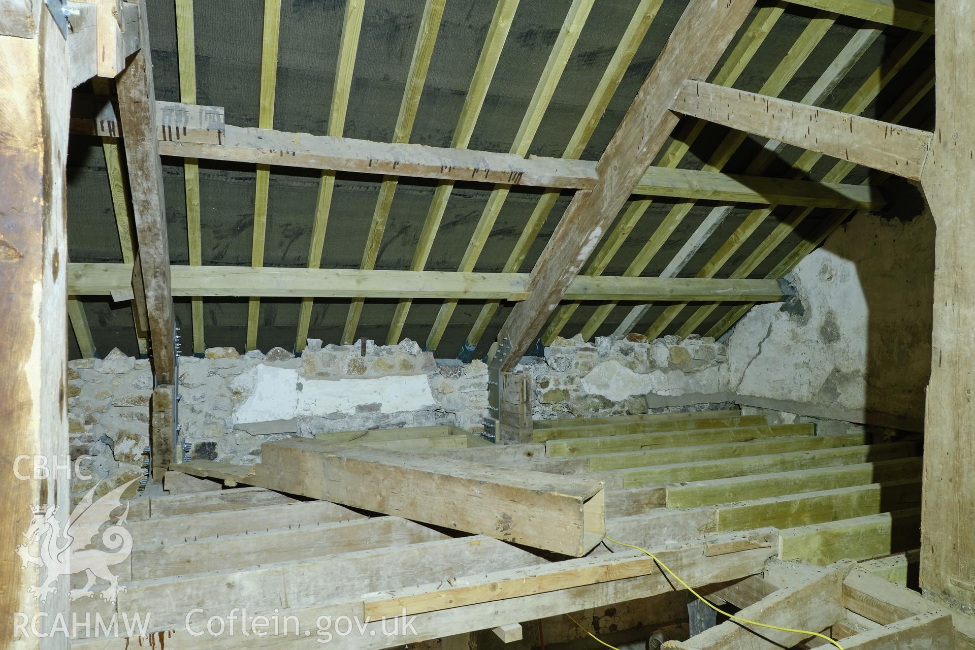 Colour photograph showing Blackpool Mill - attic showing floor joists and principal rafters, looking NE. Produced as part of Historic Building Recording for Blackpool Mill, carried out by Richard Hayman, June 2021.