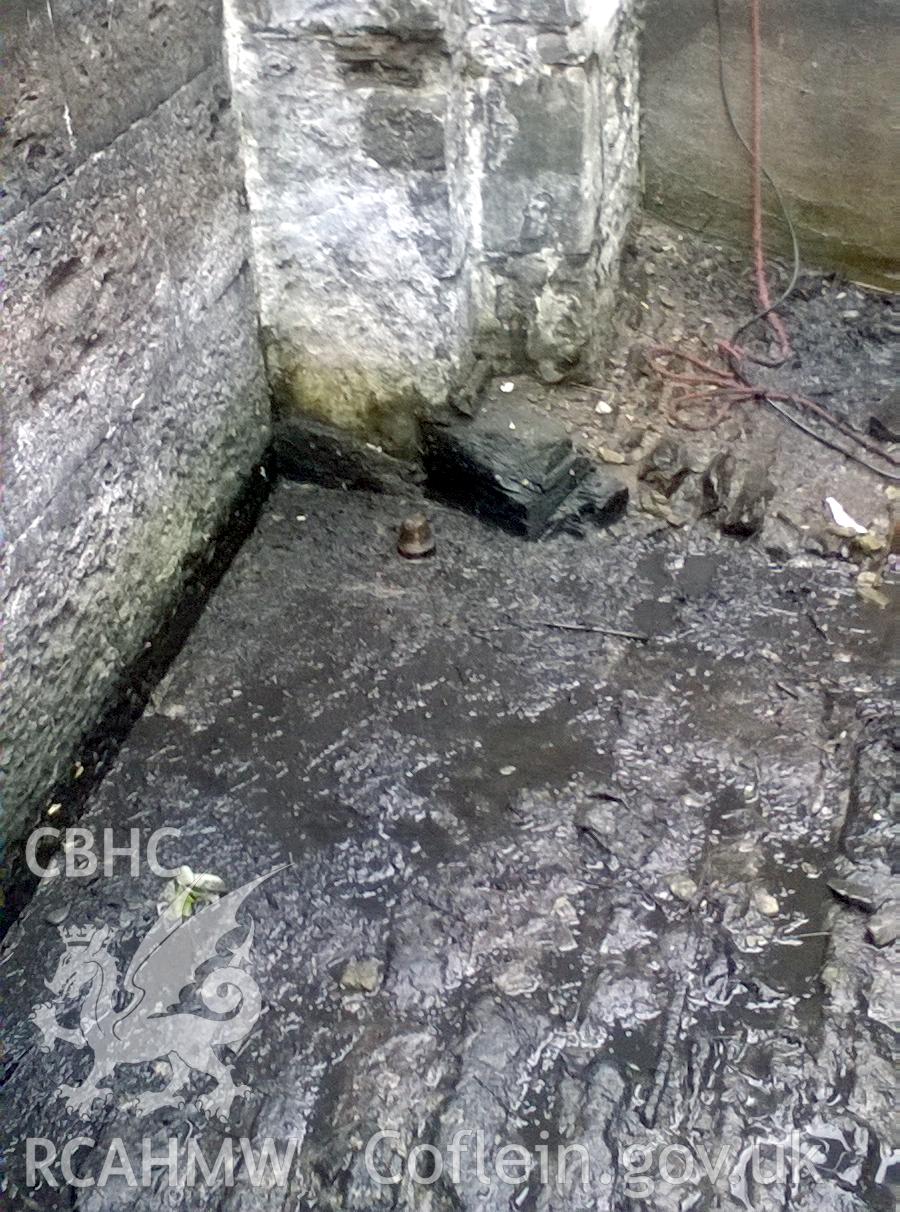 Digital colour photograph showing the lower eastern gate pivot point on the original canal bed at Lock 32 (one half of the Ynysangharad double locks) on the Glamorganshire Canal. Taken by Kelvin Merriott on 17 May 2019, during restoration work conducted by the Pontypridd Canal Conservation Group.