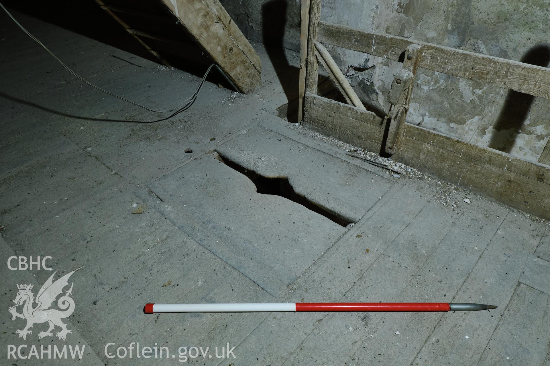 Colour photograph showing Blackpool Mill - 3rd floor, floor hatch by stairs, looking SE. Produced as part of Historic Building Recording for Blackpool Mill, carried out by Richard Hayman, June 2021.