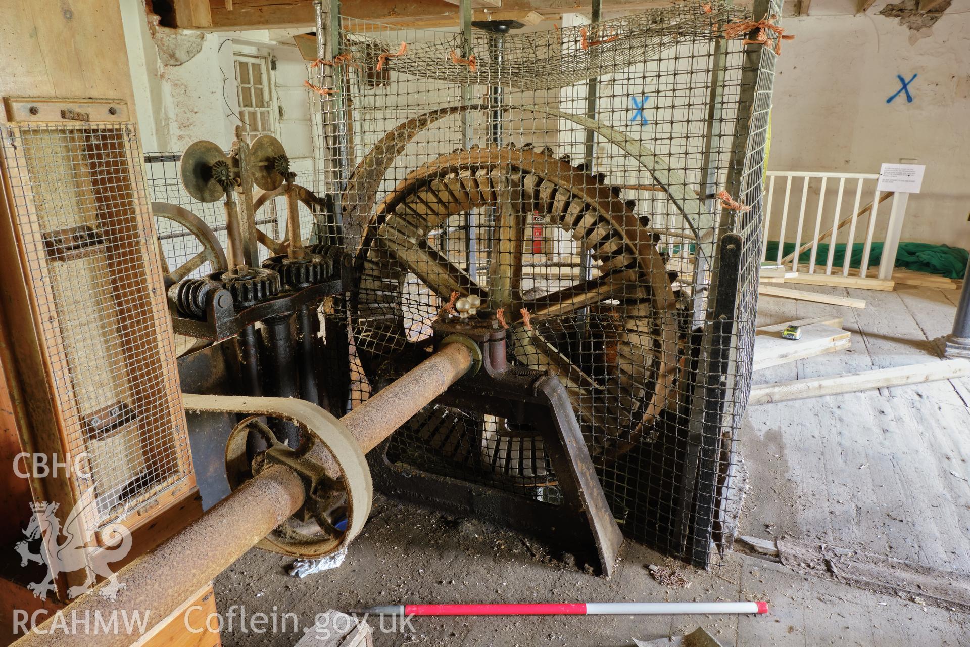Colour photograph showing Blackpool Mill - ground floor, end of lay shaft over turbine, looking SW. Produced as part of Historic Building Recording for Blackpool Mill, carried out by Richard Hayman, June 2021.