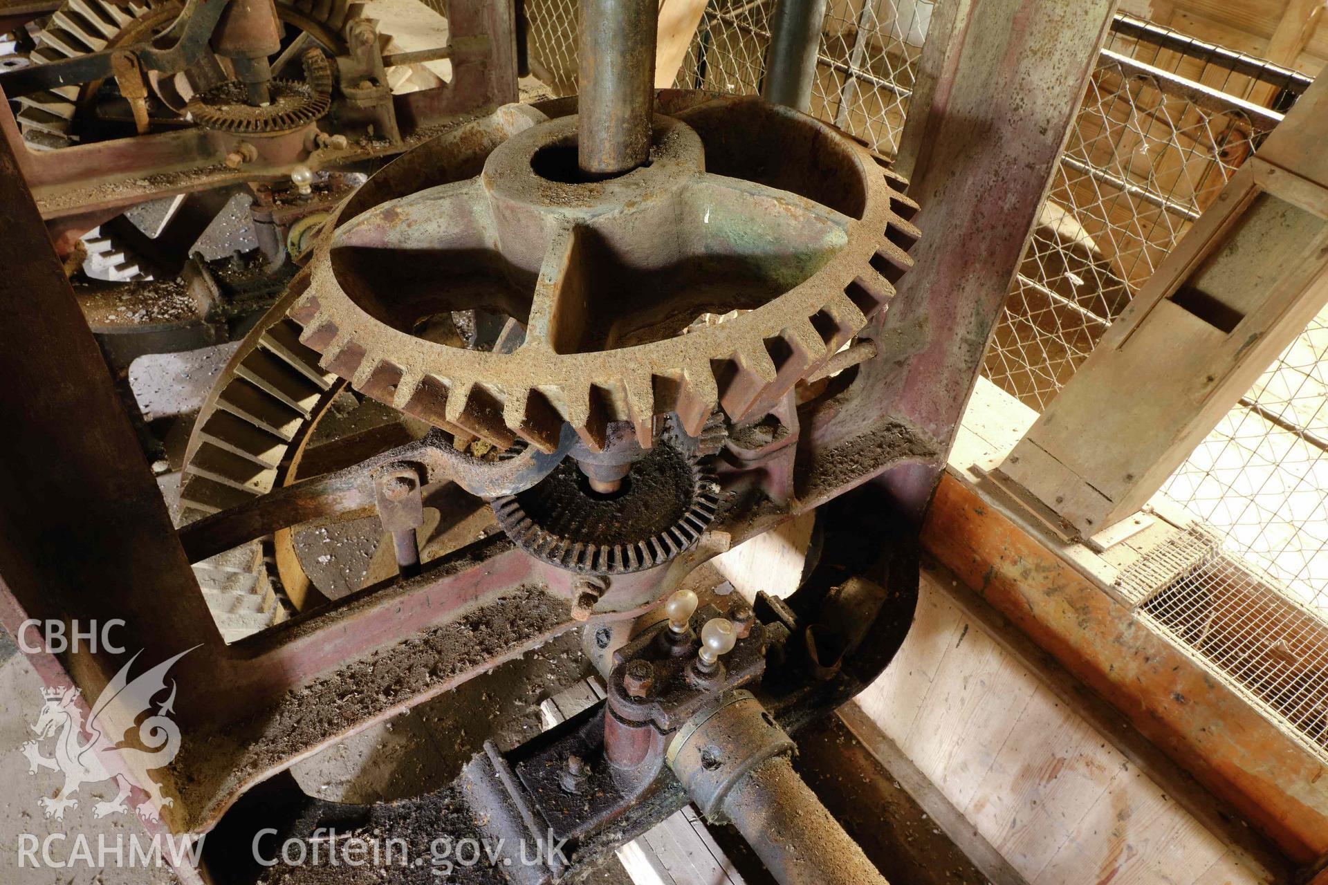 Colour photograph showing Blackpool Mill - bevelled gears driving grindstones. Produced as part of Historic Building Recording for Blackpool Mill, carried out by Richard Hayman, June 2021.