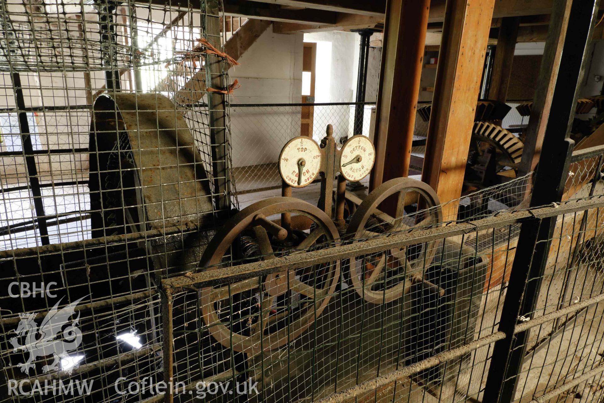 Colour photograph showing Blackpool Mill - ground floor, turbine controls, looking NE. Produced as part of Historic Building Recording for Blackpool Mill, carried out by Richard Hayman, June 2021.