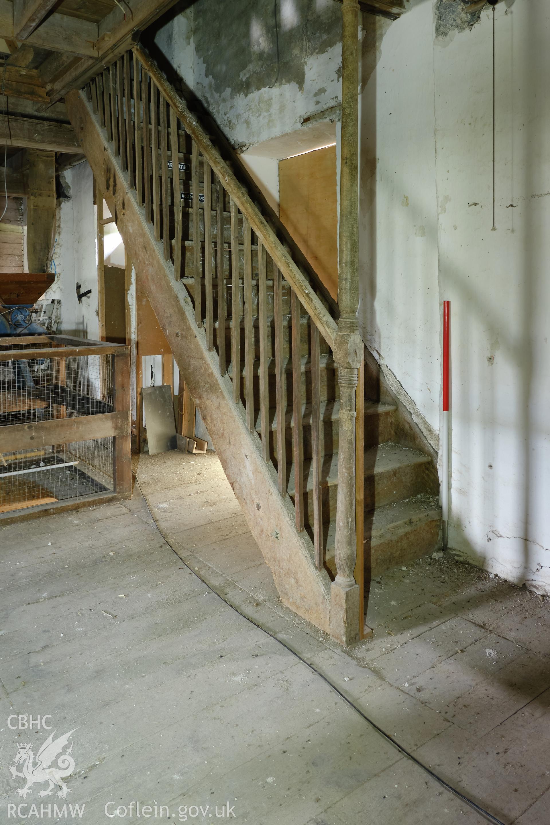 Colour photograph showing Blackpool Mill - stair, 1st-2nd, looking SE. Produced as part of Historic Building Recording for Blackpool Mill, carried out by Richard Hayman, June 2021.