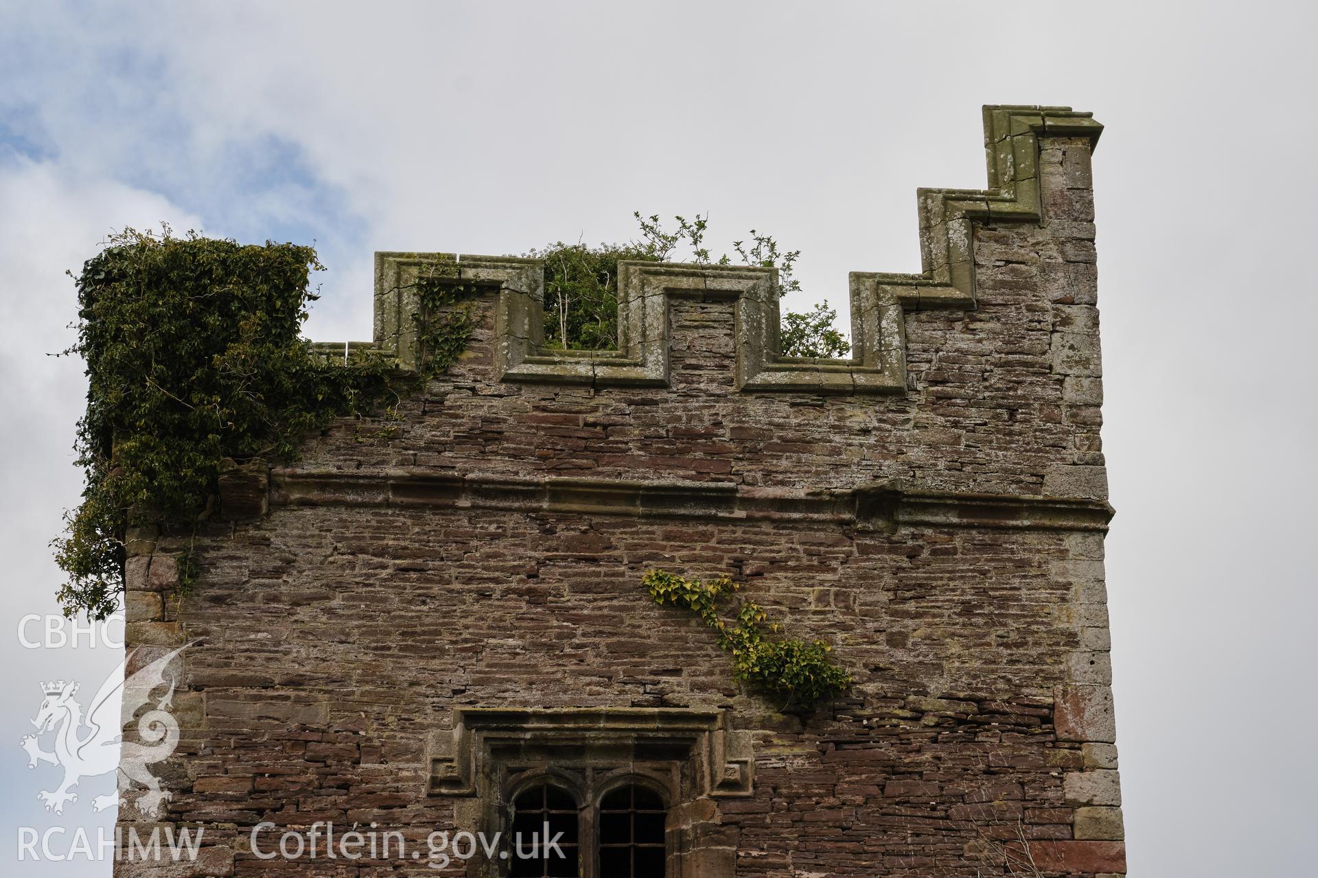Colour photograph showing Great Porthmel Gatehouse - parapet SE front. Produced as part of Historic Building Recording for Great Porthamel Gatehouse, carried out by Richard Hayman, April 2021.