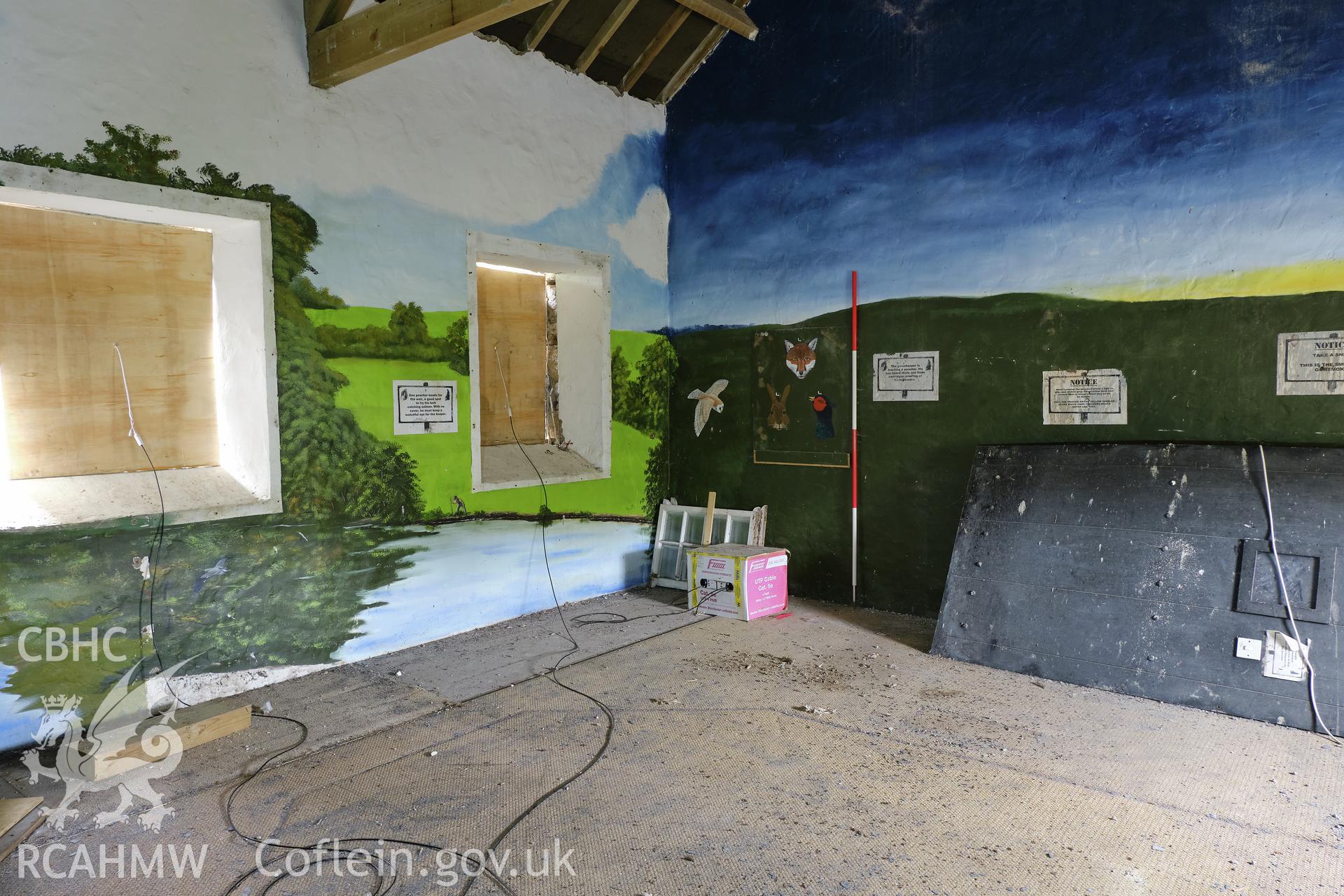 Colour photograph showing Blackpool Mill - SW wing, 1st floor, looking SW. Produced as part of Historic Building Recording for Blackpool Mill, carried out by Richard Hayman, June 2021. Shows wall painting.